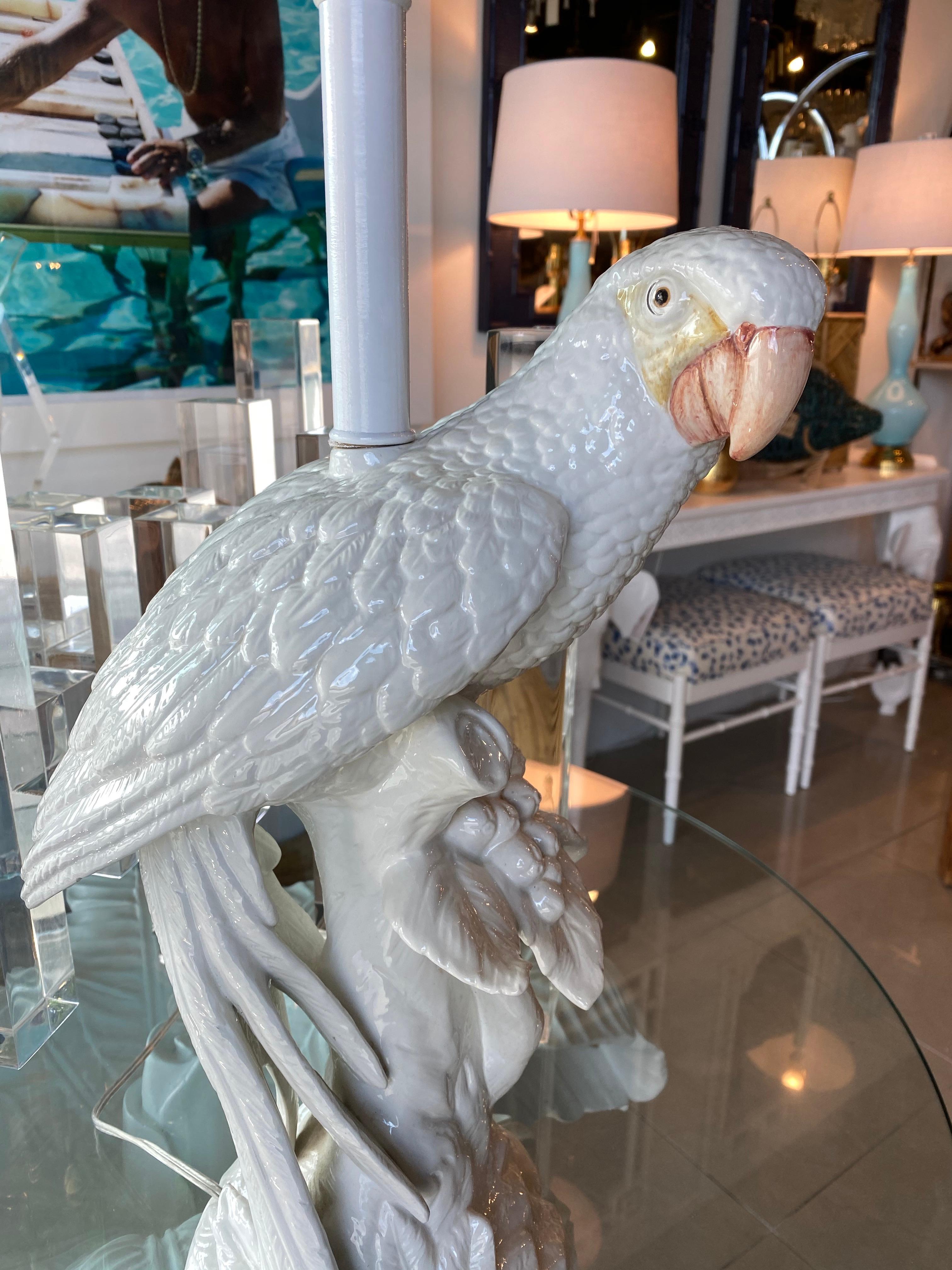 Amazing Palm Beach tropical vintage Italian white ceramic parrot bird table lamp. No chips or breaks. This has been newly wired and has all new brass hardware. 
Height to socket 23
