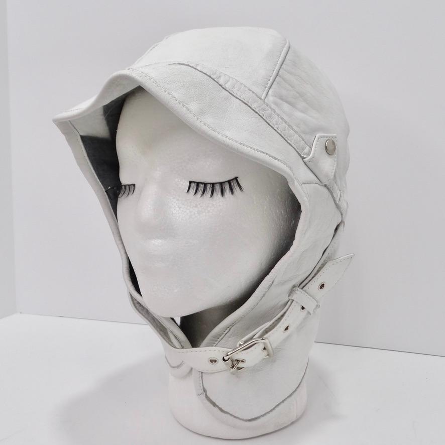 How fun is this incredible vintage helmet style aviator hat! Perfect for anyone on the hunt for their next go-to statement hat, this style of hat is so eye catching and unique yet timeless and classic at the same time! White leather classic aviator
