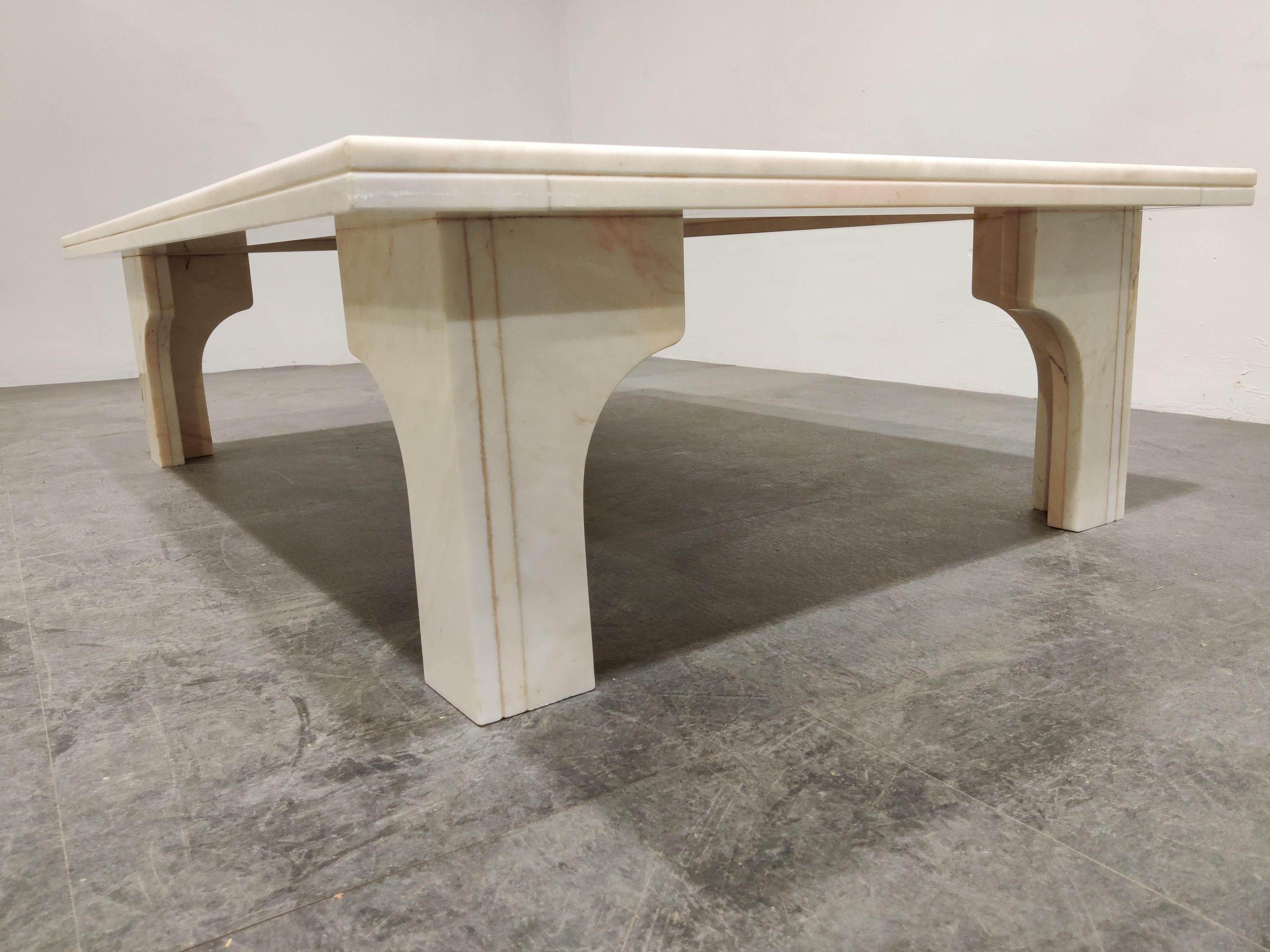 Timeless white marble coffee table with arched legs.

Beautiful thick marble stone tabletop and legs.

Good quality marble with lovely waining, custom made piece for the client back in the days and was made locally in Belgium.

Very good