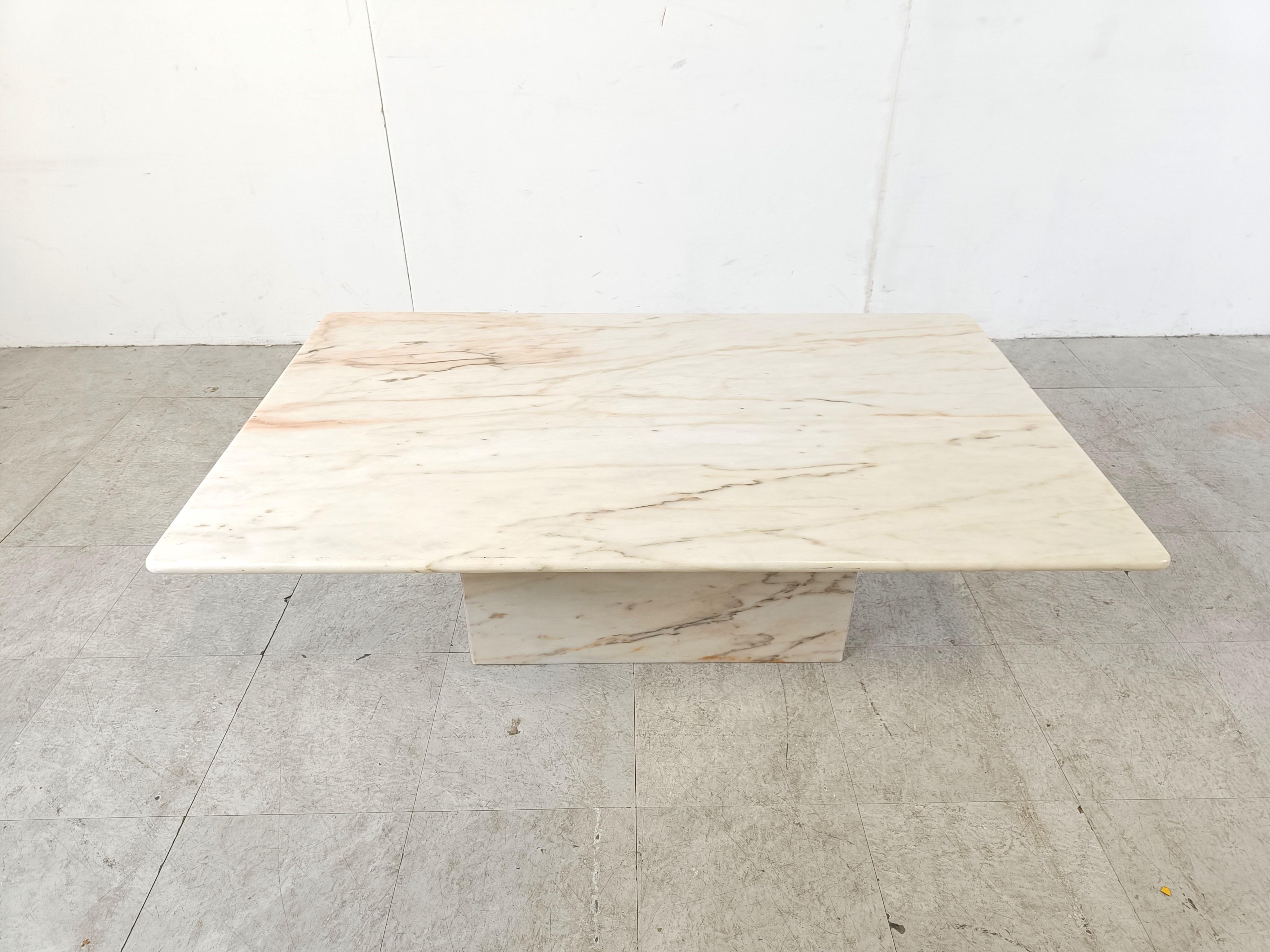 Rectangular white marble coffee table with a central base.

The marble has a beautiful natural veining all over.

Good condition with normal age related wear.

1970s - Italy

Height: 40cm/15.74