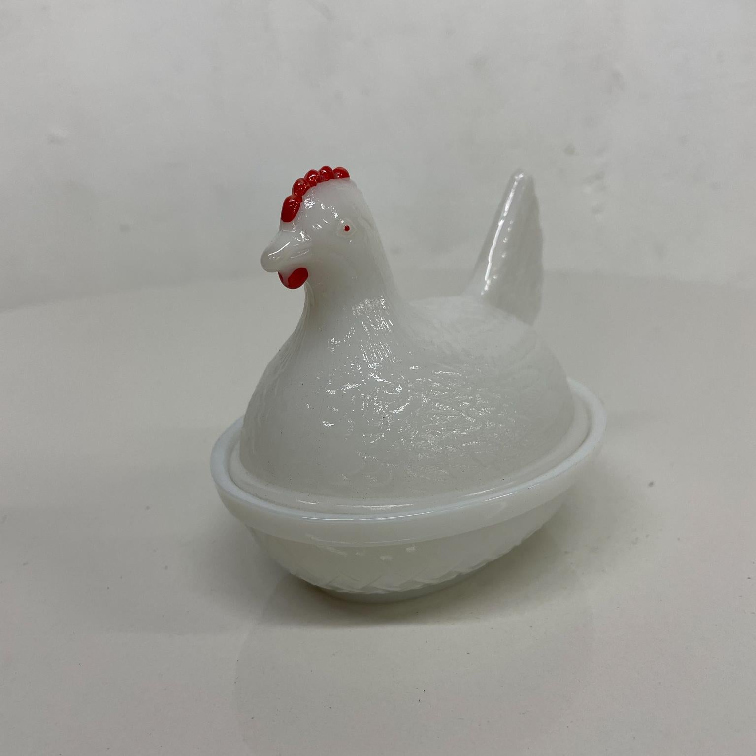 Mini glass HEN dish
Vintage white milk glass mini chicken sitting hen on nest covered dish chicken has red comb
Measures: 4.75 D x 3.88 W x 3.75 H
Preowned unrestored vintage condition
See images please.



