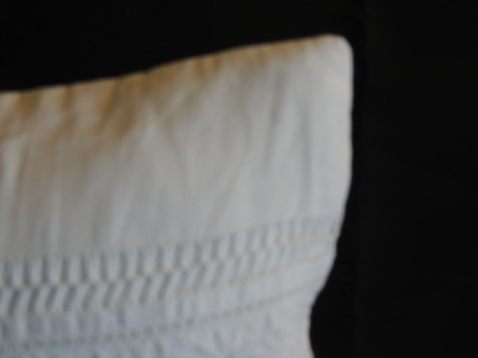 white eyelet pillow