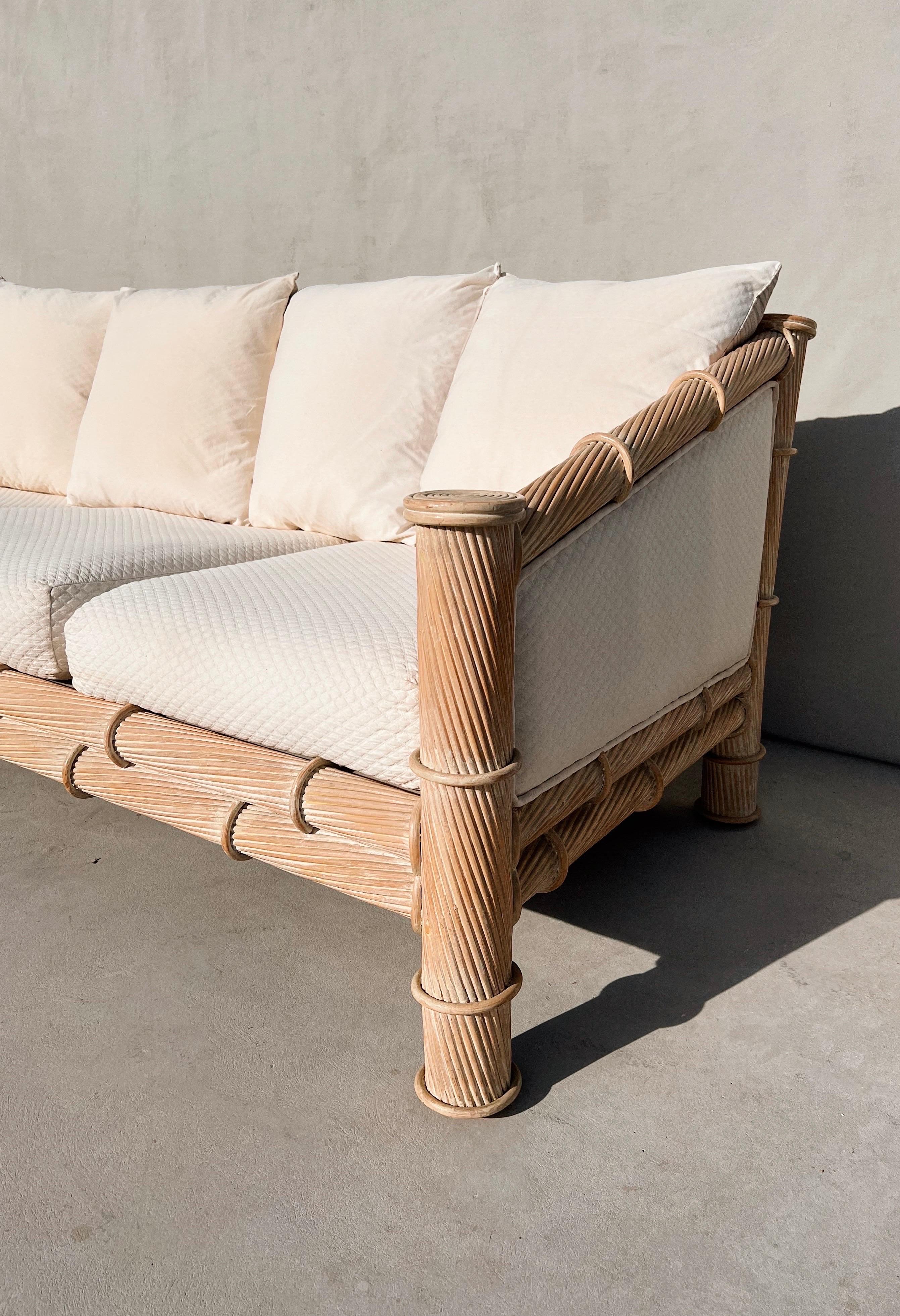 Vintage white pencil reed sofa attributed to Gabriella Crespi.

A one of a kind piece- intricately handcrafted with curved, twisted and twirled pencil reed. The reed has soft, warm undertones of sandy beige and almond with patina of worn white