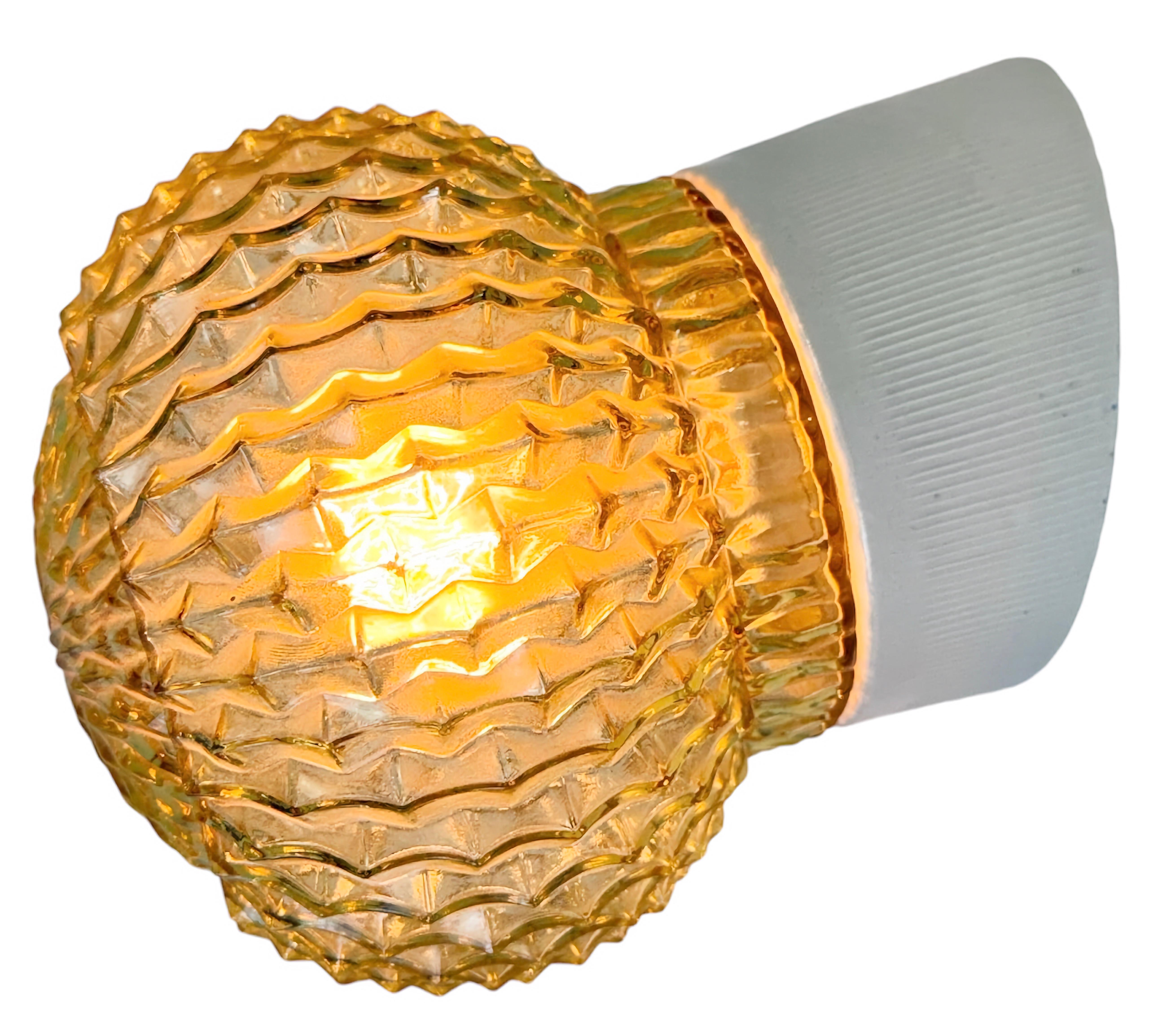Vintage industrial light made in former Czechoslovakia the 1970s. It features a white porcelain wall mounting and a glass cover. The socket requires standard E27/E 26 light bulbs. New wire. The weight of the lamp is 1 kg.
Dimensions: 
Diameter of