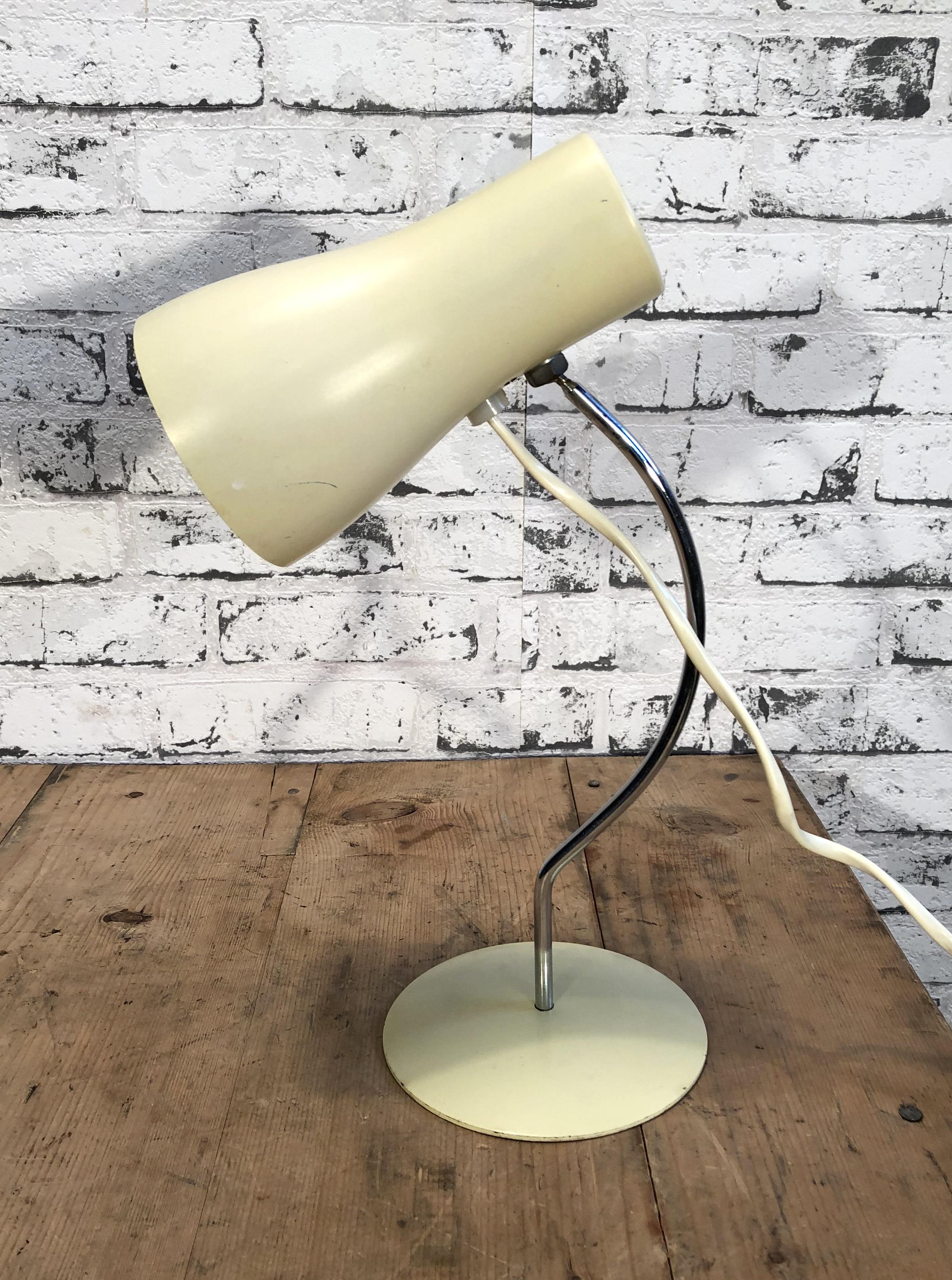 This table lamp, Napako model 1633, was designed by Josef Hurka and produced in former Czecholovakia by Napako during the 1960s. Lamp has steel body and metal lampshade. In a good vintage condition. Small signs of use. Fully functional. Socket for E