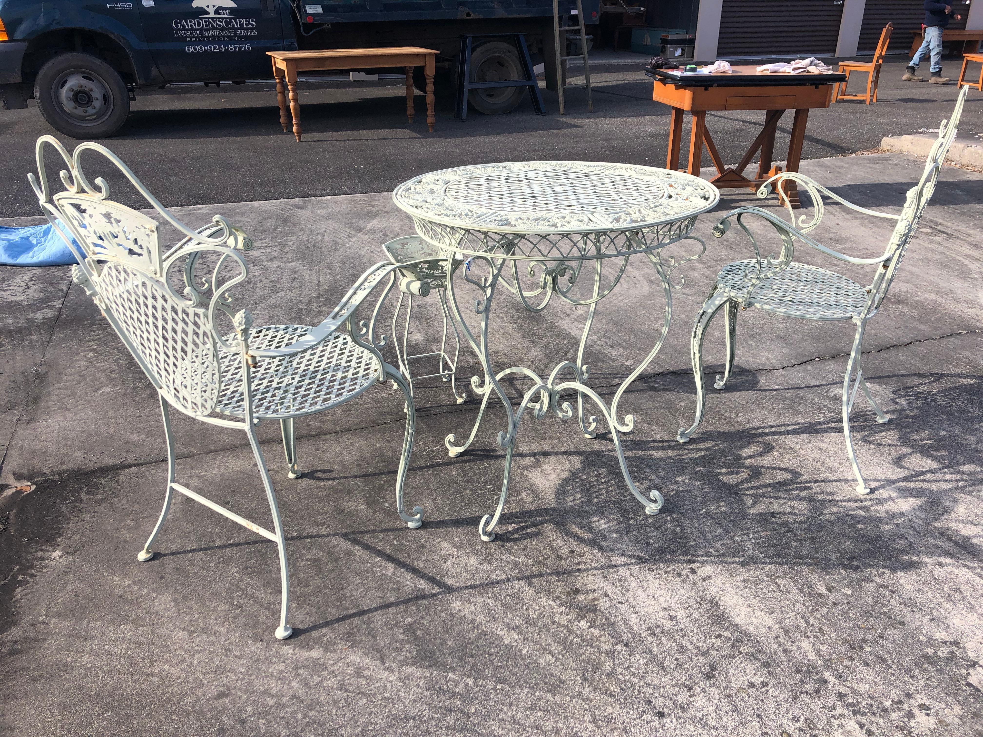 white wrought iron bistro set