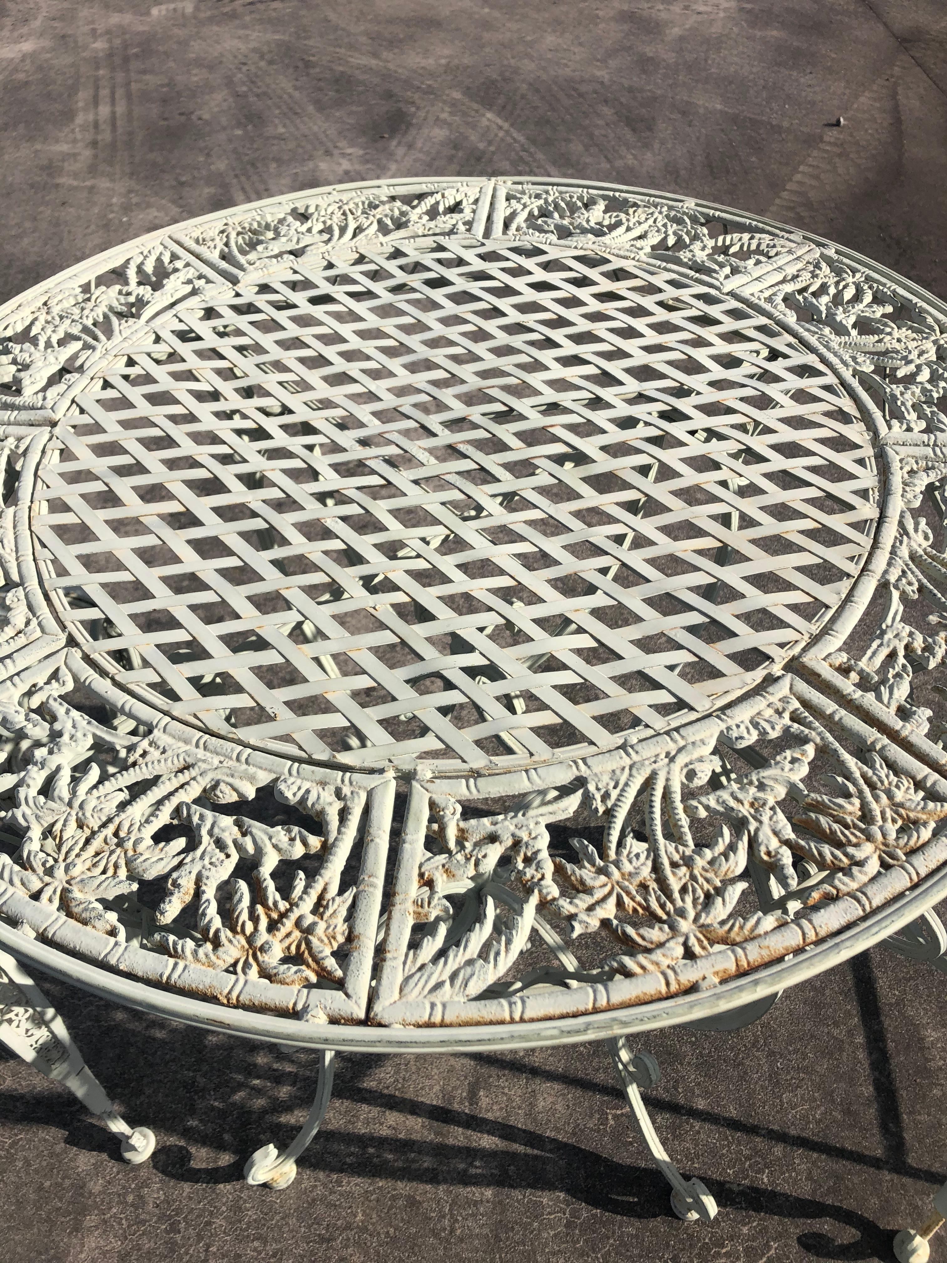 white wrought iron bistro table