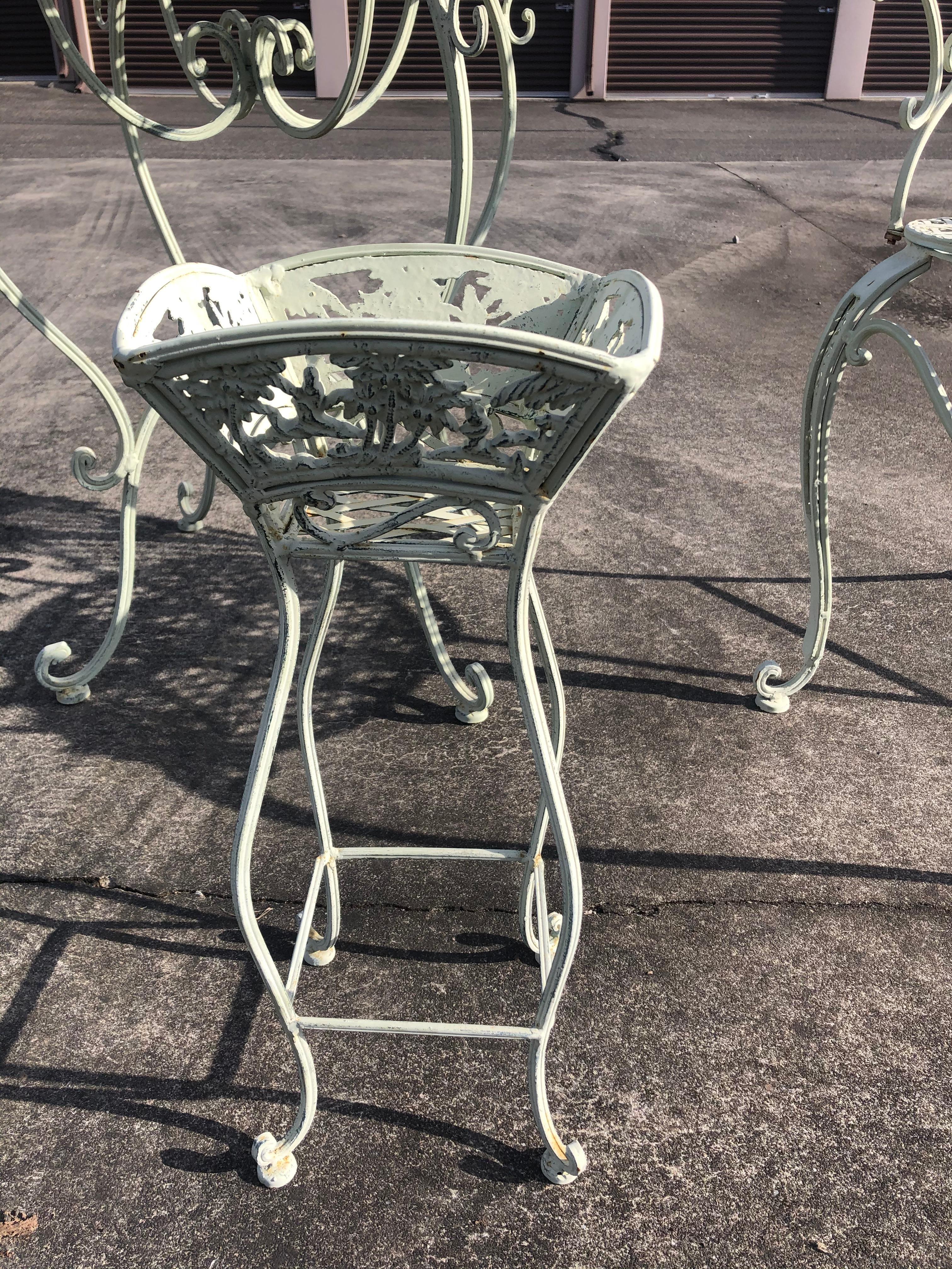 Vintage White Wrought Iron Round Bistro Table with Matching Armchairs In Good Condition In Hopewell, NJ