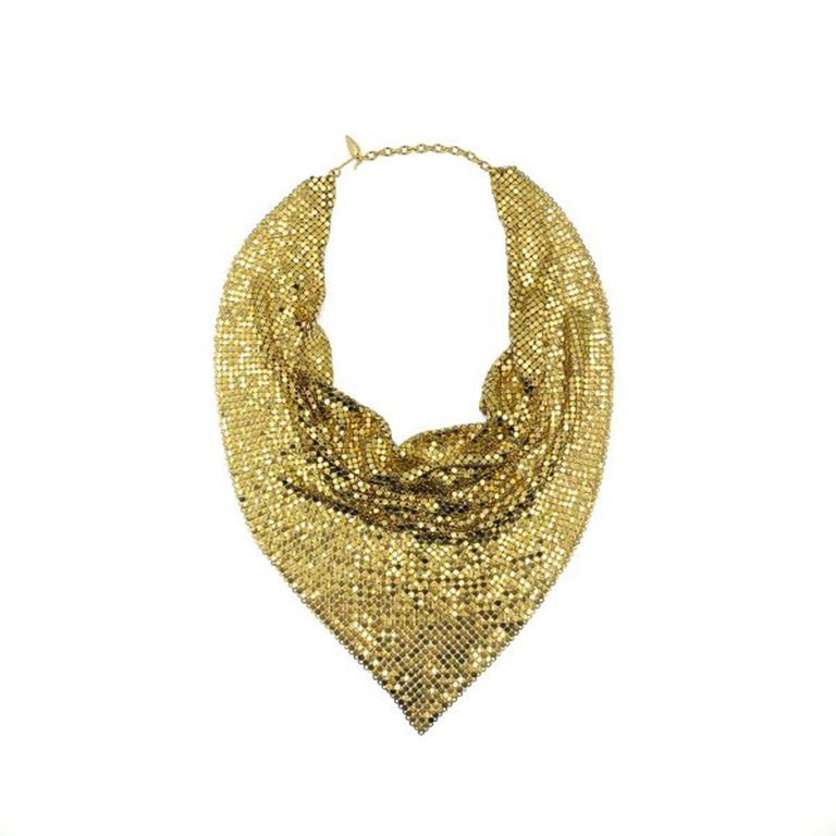 A striking Vintage Whiting and Davis Scarf Necklace. American designer Whiting & Davis, famed for their mesh bags and vanity accessories produced a fabulous range of mesh scarf style necklaces in the 1970s. Crafted in gold plated metal mesh, the