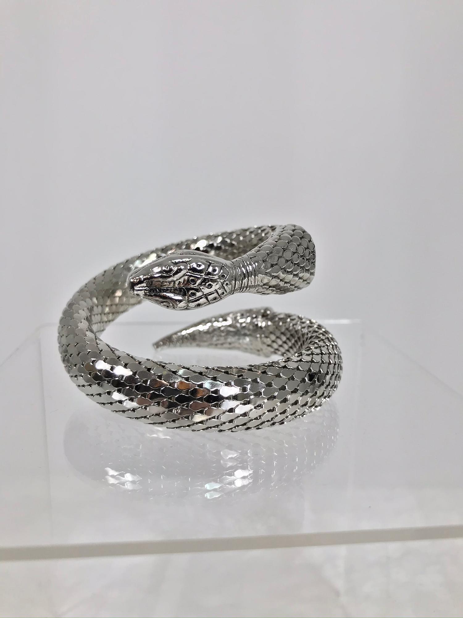 Vintage Whiting and Davis silver metal mesh coiled snake bracelet from the 1970s. With the original box from Jordan Marsh. Will fit many wrists.
