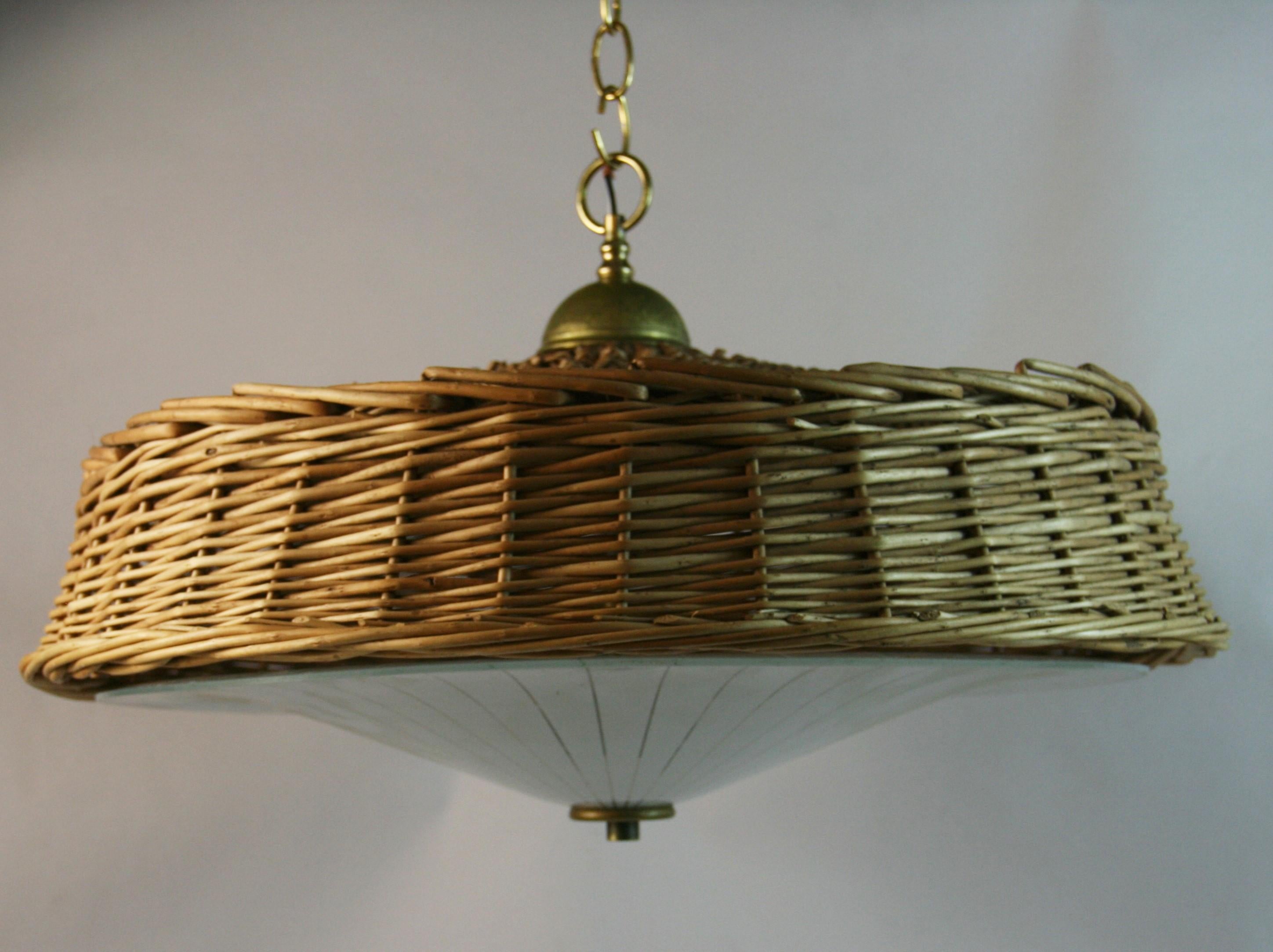 1768 Wicker pendant with white art glass with decorative strips
Takes 3 60 watt bulbs.
Supplied with 2 feet chain and canopy