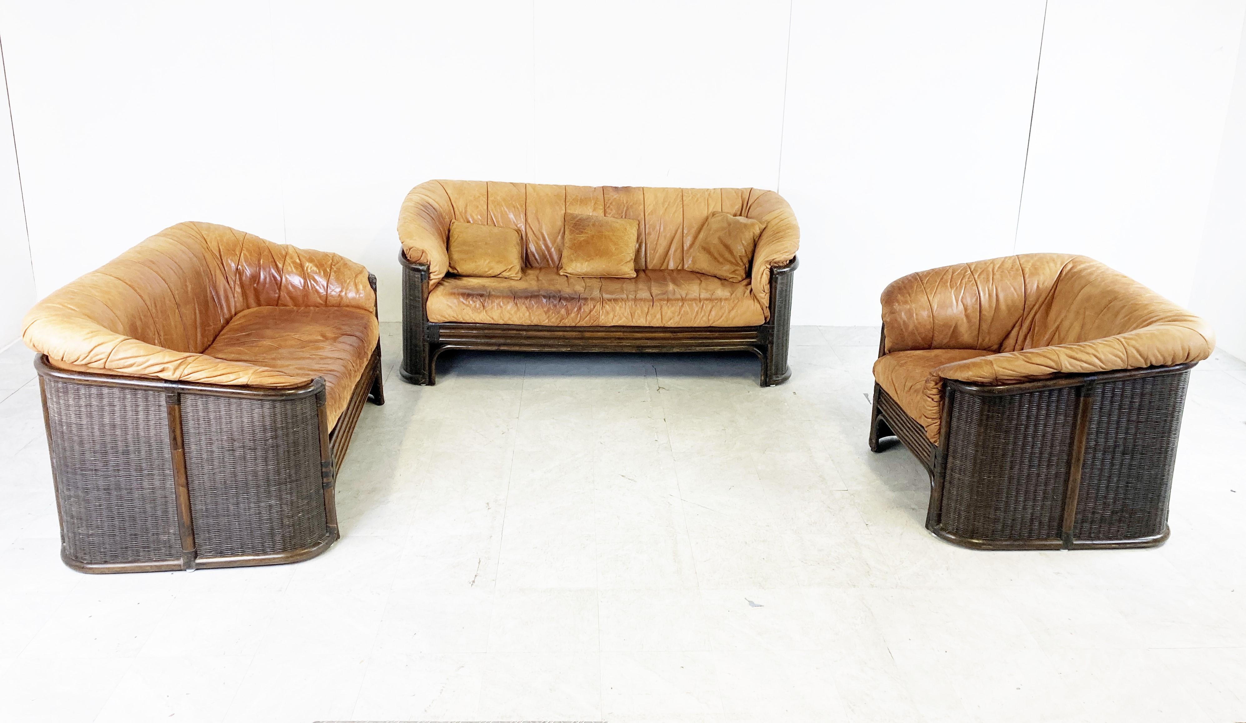 Mid-century wicker, bentwood and patinated leather sofa set.

The set consists of a 3, 2 and 1 seater sofa.

The leather is beautifully patinated and has the original cushions.

1960s - France

Dimensions
3 seater:
Height: