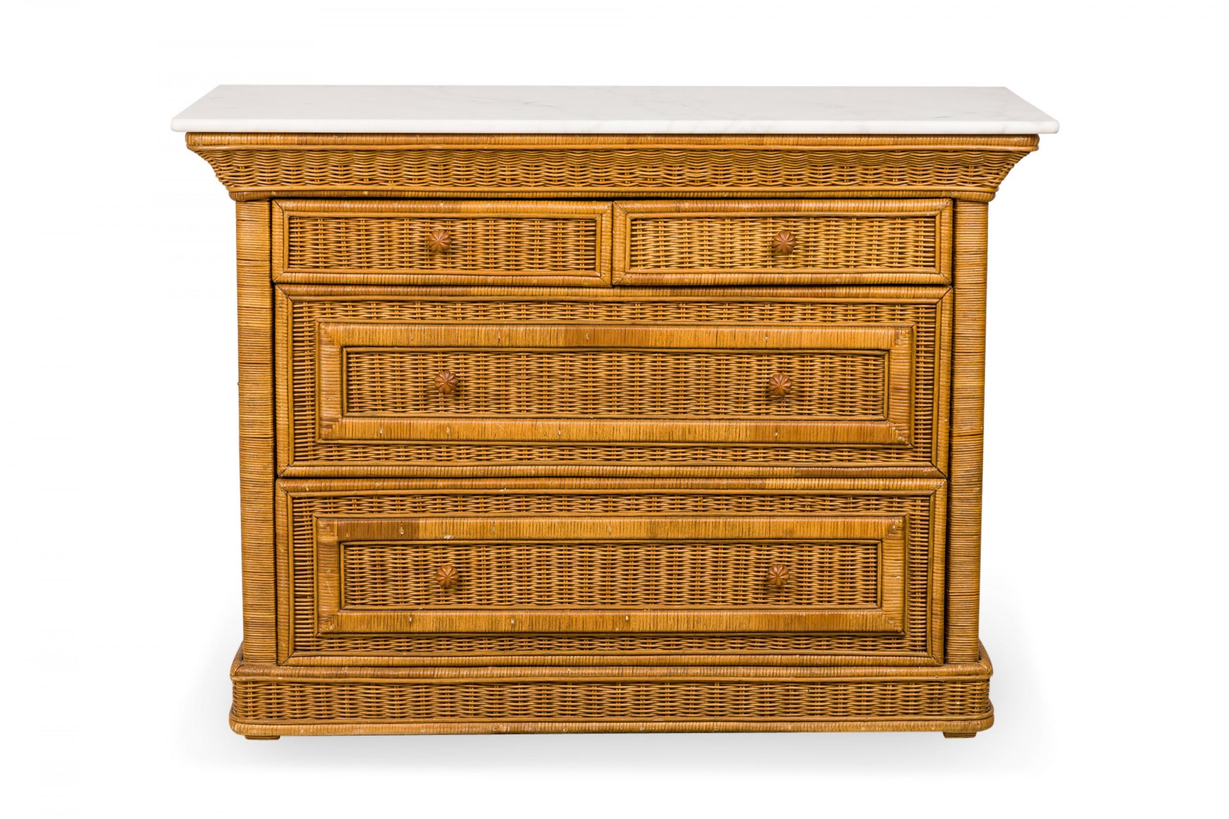 Contemporary wicker 4-drawer upright chest with a rattan-wrapped trim, and carved wooden drawer pulls, topped with a piece of white marble.
