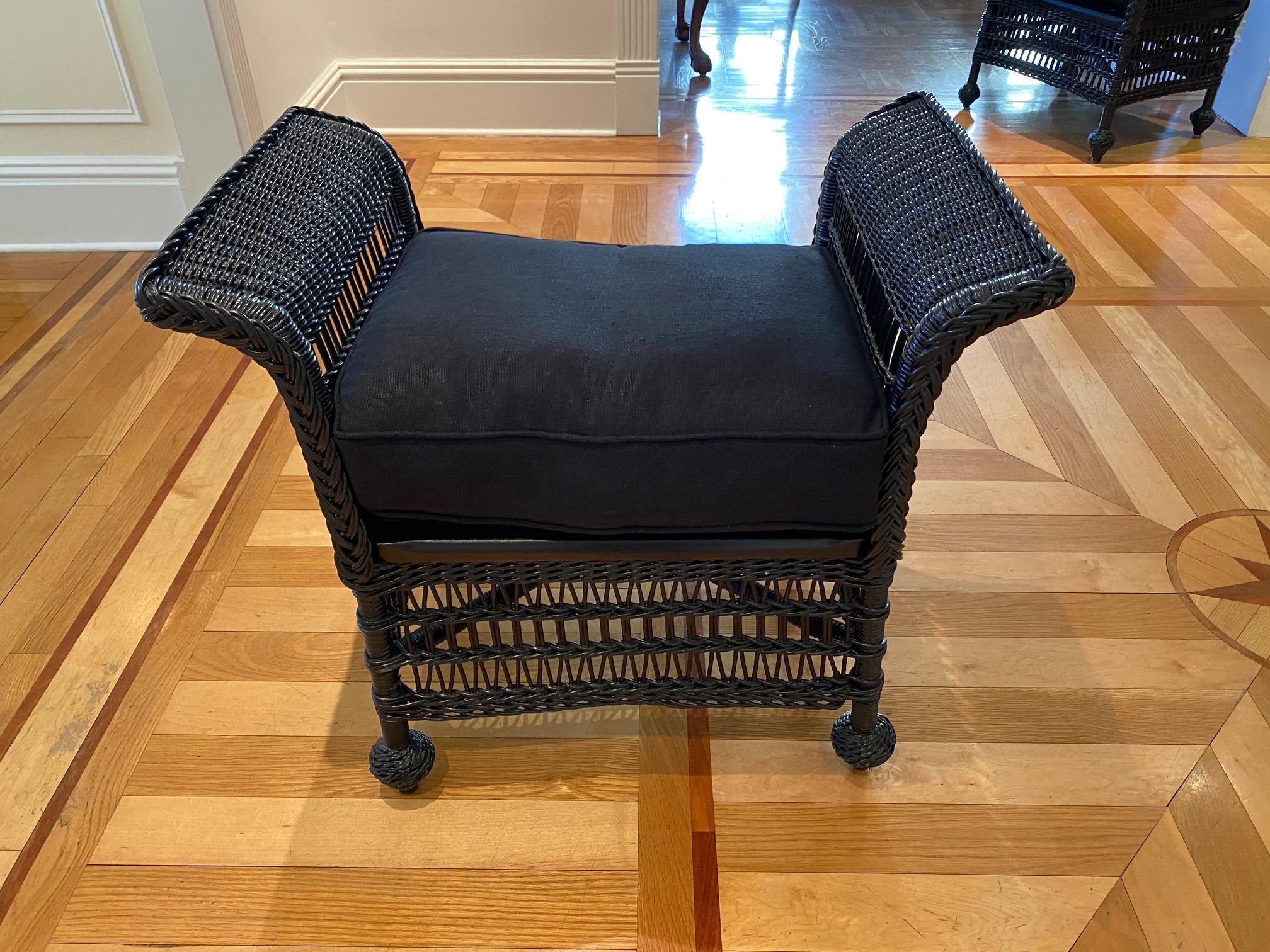 Vintage wicker bench or footstool in black finish, upholstered in black linen.
This is a Classic vintage wicker piece was updated with a sharp black finish and upholstered in a single cushion in black linen. Please note this is part of a larger