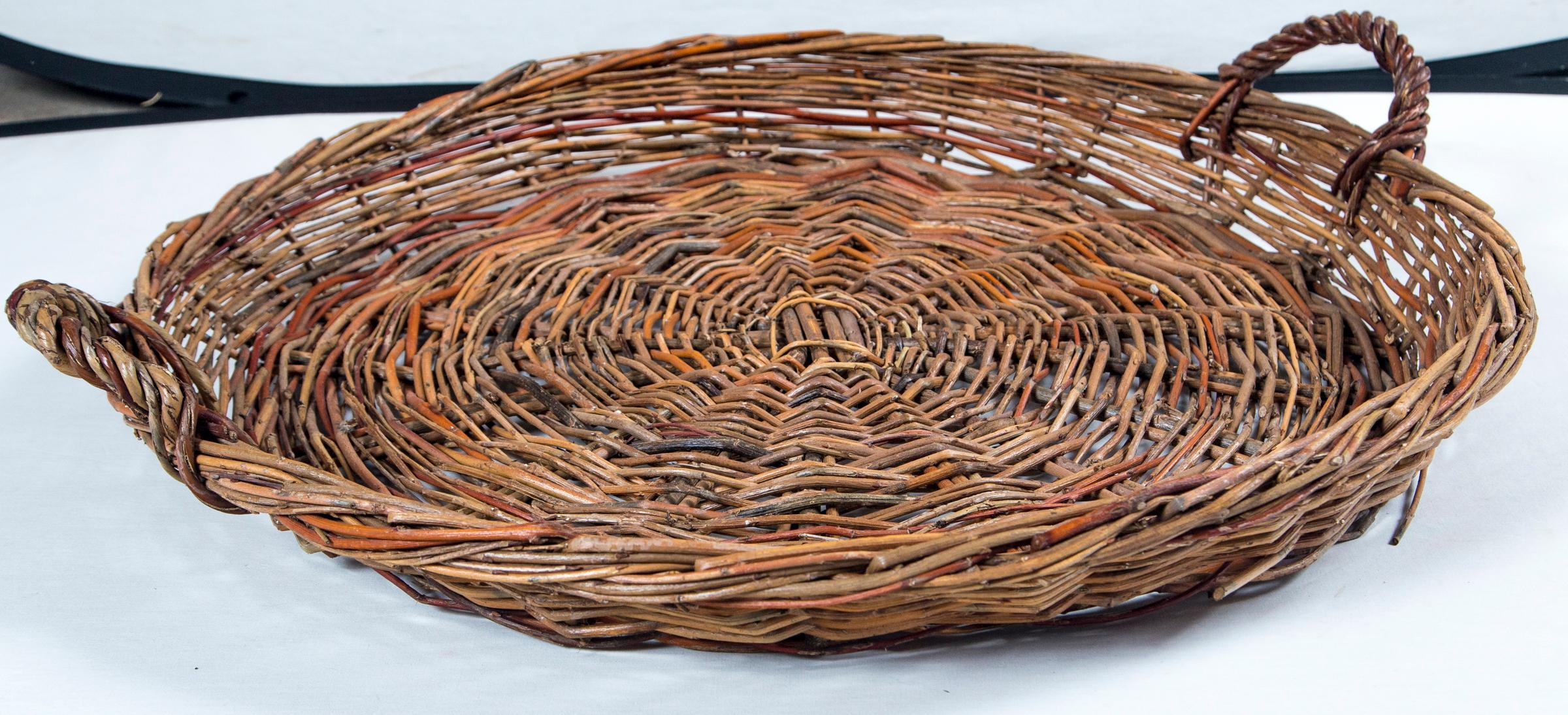 Vintage Wicker grape basket, France, circa 1950. Woven willow wicker with 2 handles. A vineyard basket used in the field during the grape harvest.