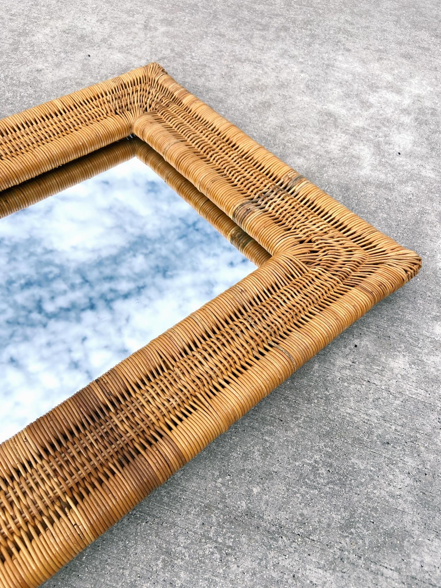 Amazing wicker woven mirror from the 1970’s with beautiful contrasting wicker throughout.