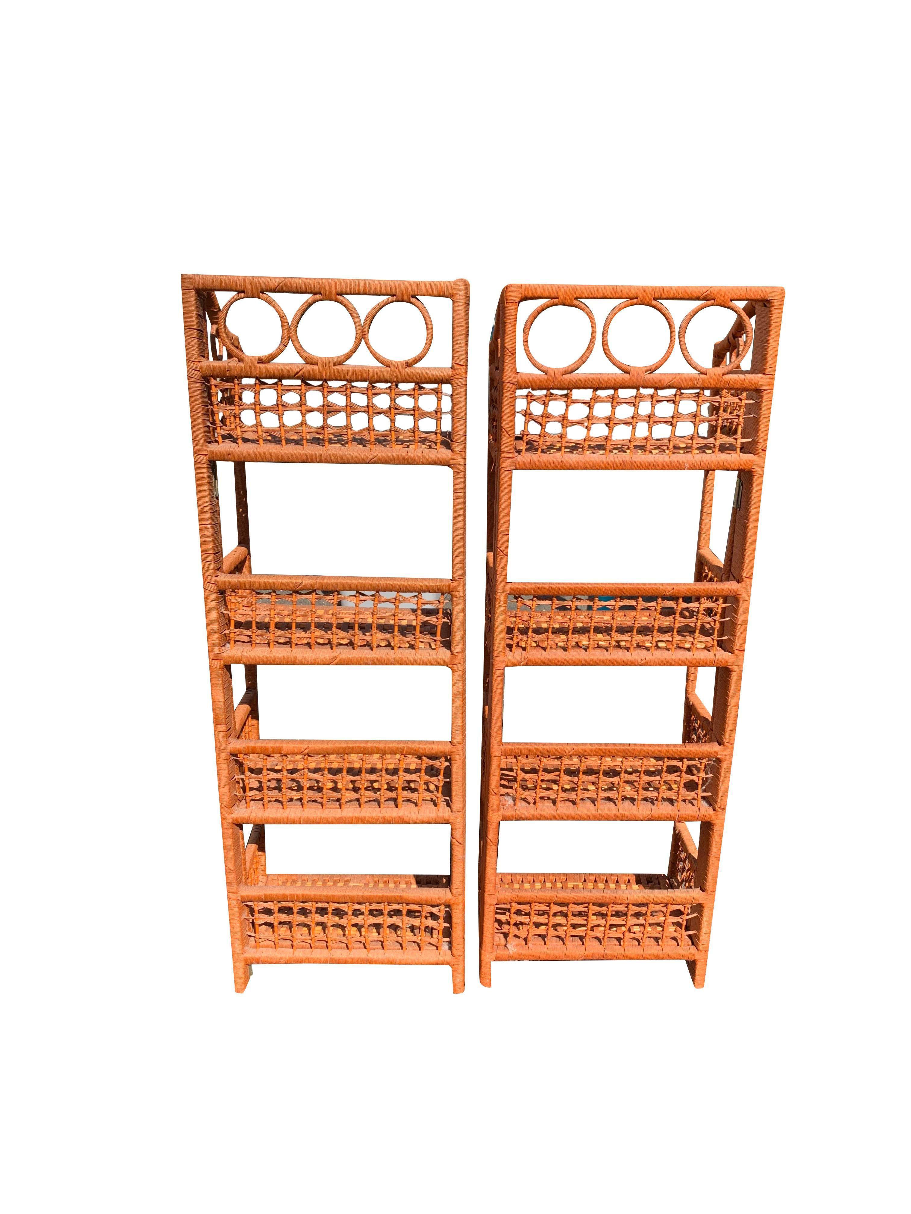 Vintage Wicker Rattan Folding Free Standing Storage Shelves - A Pair.

Add a touch of bohemian chic to your home with this versatile pair of vintage wicker rattan folding storage shelves. These functional and stylish pieces offer a unique way to