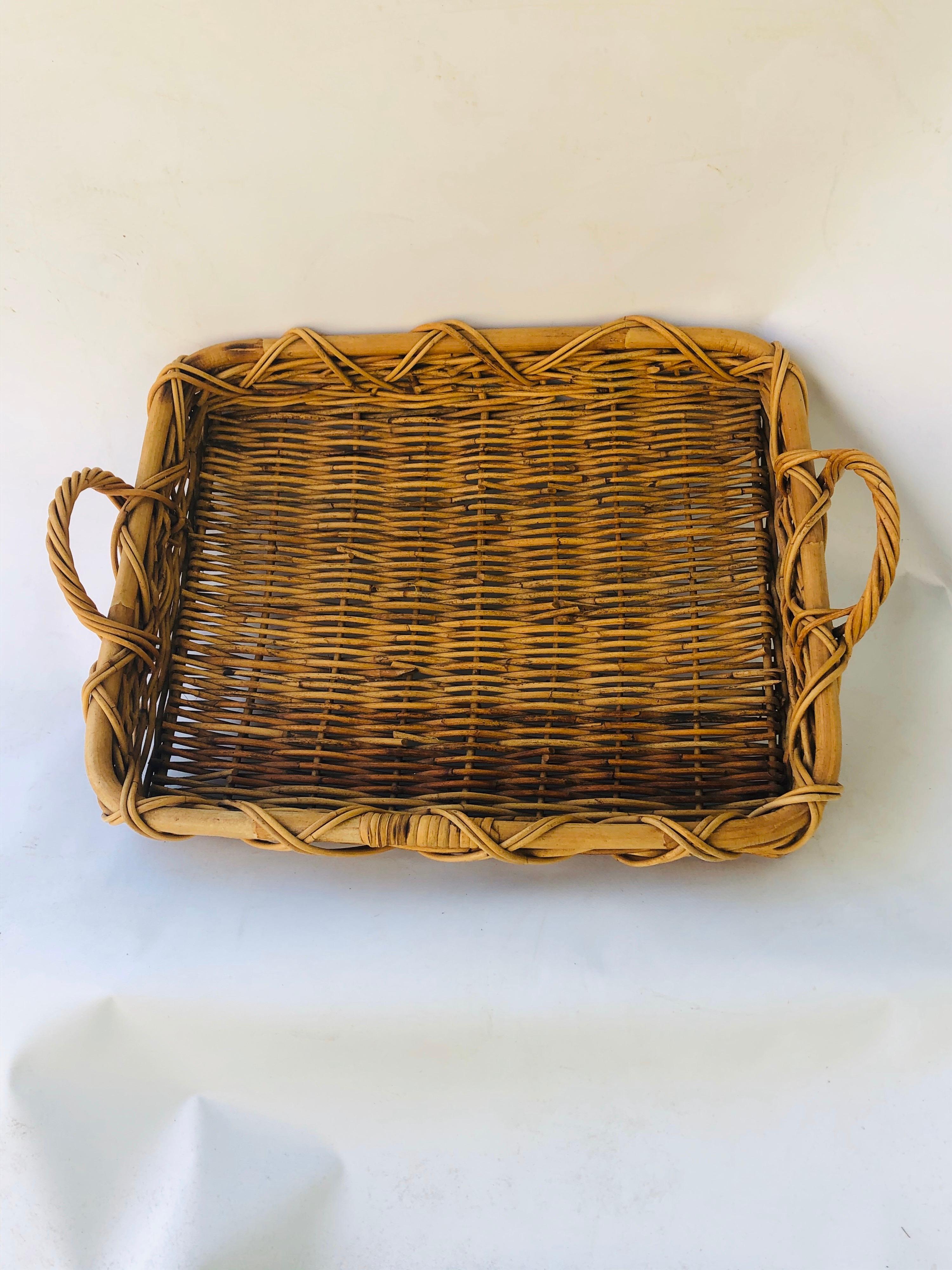 Wonderful large size vintage wicker serving tray. Large enough to accommodate a placemat. Handles at either end for carrying. Good looking. No losses to the wicker.