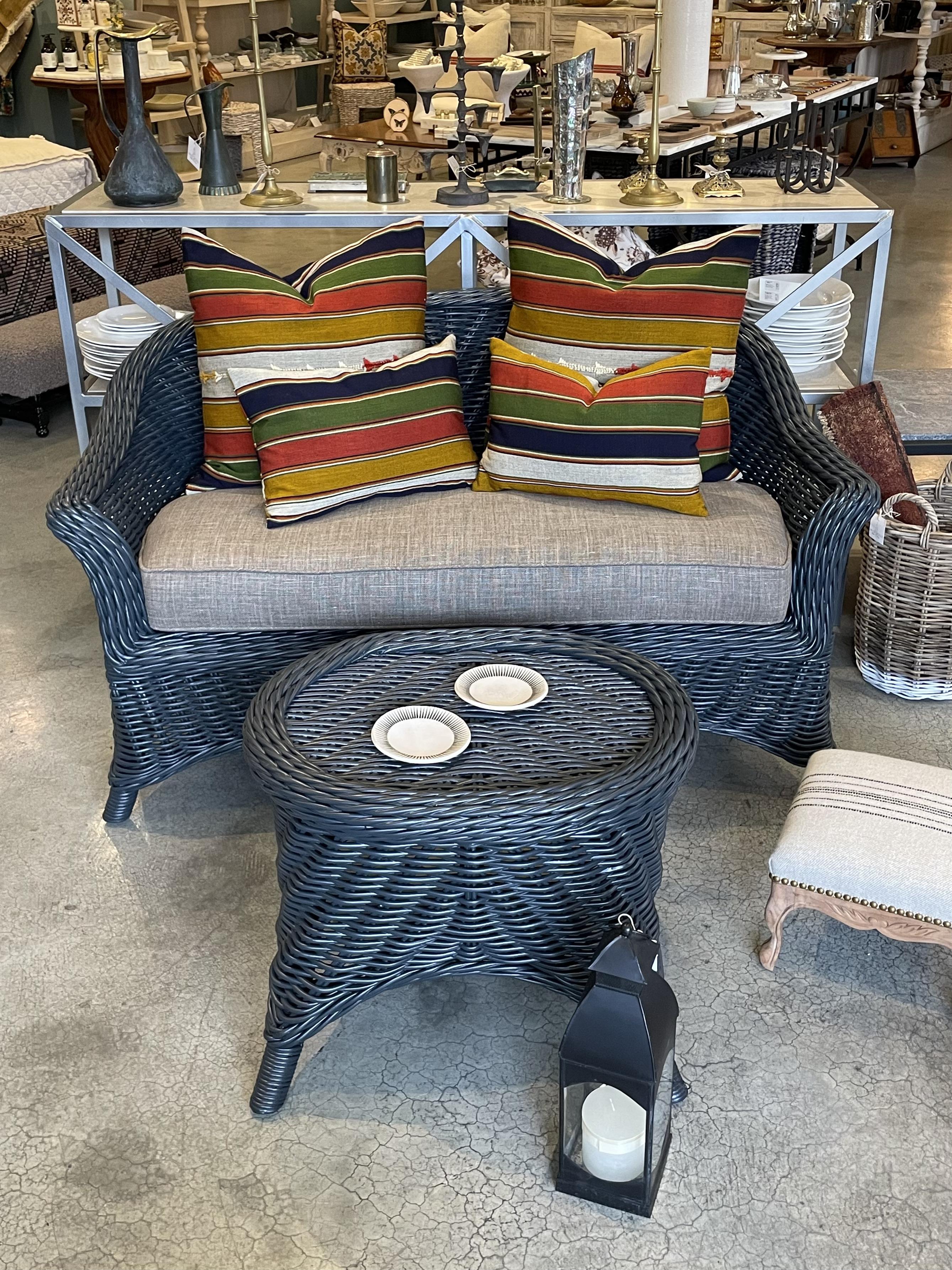 The perfect spot for an afternoon read or sharing tea for two. This lovely vintage wicker settee has been newly painted in a soothing blue/grey finish and coupled with a newly upholstered cushion in a classic complimentary taupe linen. Take a seat,