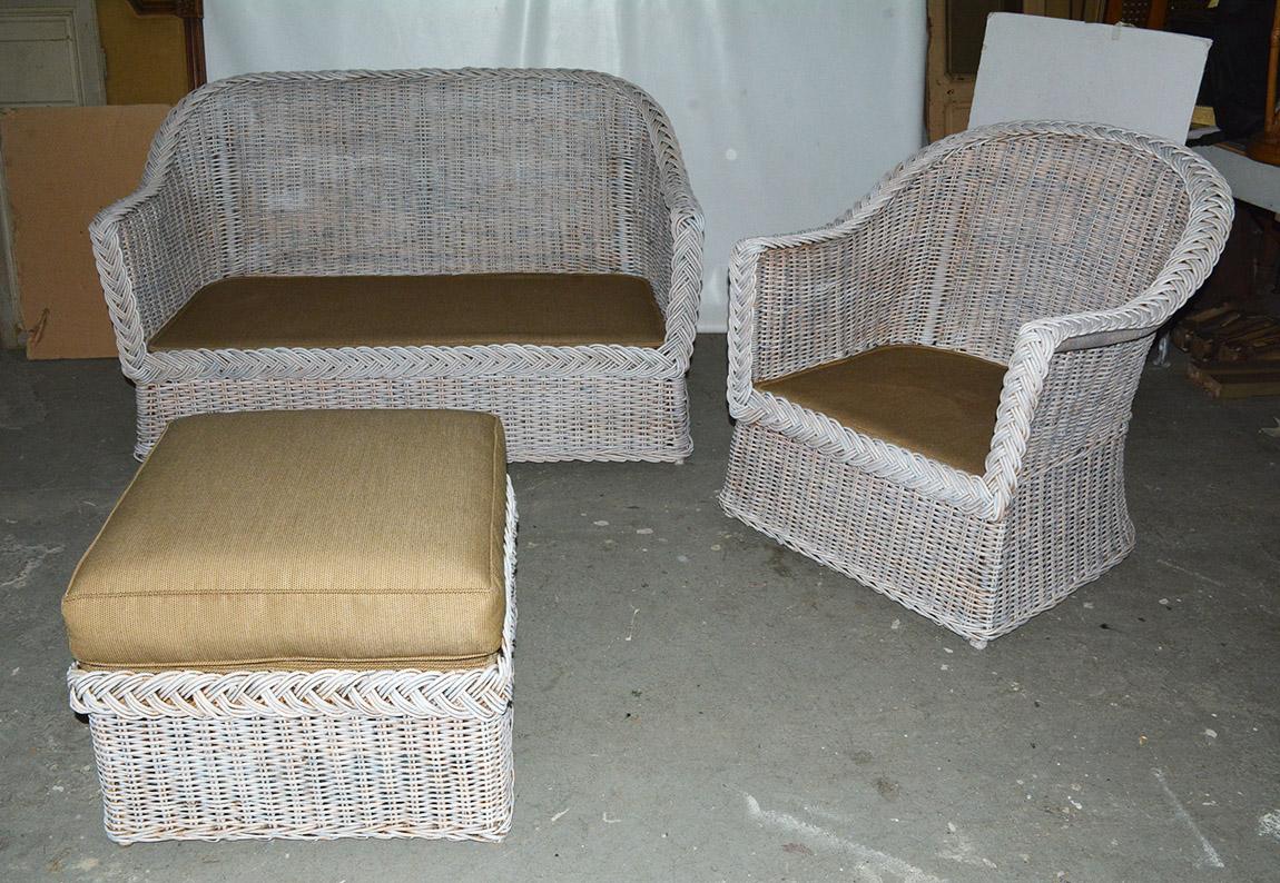 Contemporary white washed wicker sofa/loveseat with matching lounging armchair and ottoman. Great for porch, patio or garden room.
Armchair measures: 34 x 33 x 30 inches.
Rattan, stick wicker.