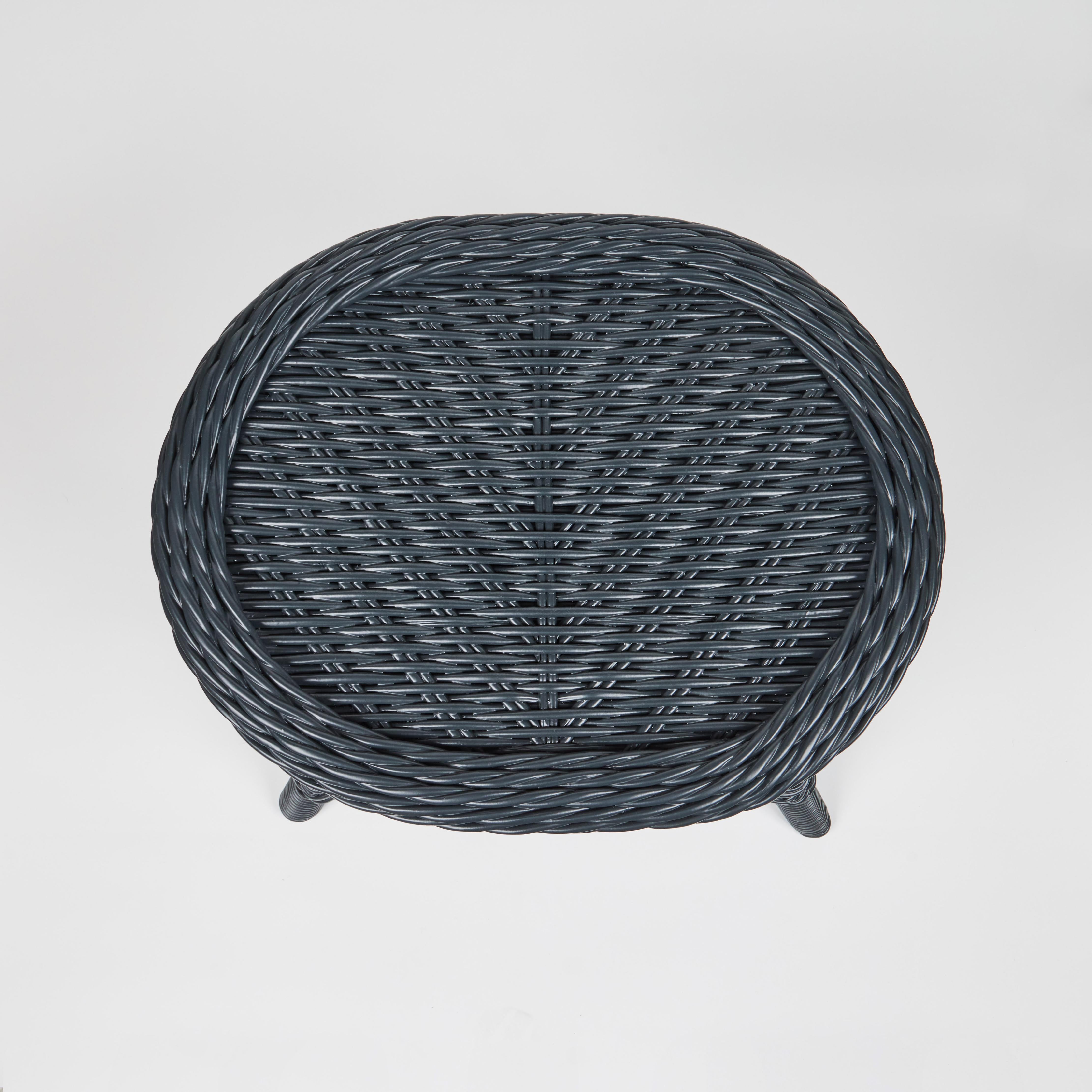 ​L​ooking for a small table with charm and interest? This vintage wicker table ​has been newly painted in a soothing blue/grey finish and is ready for cocktails, tea or afternoon reads. It offers a lovely pop of color or fades quietly next to your