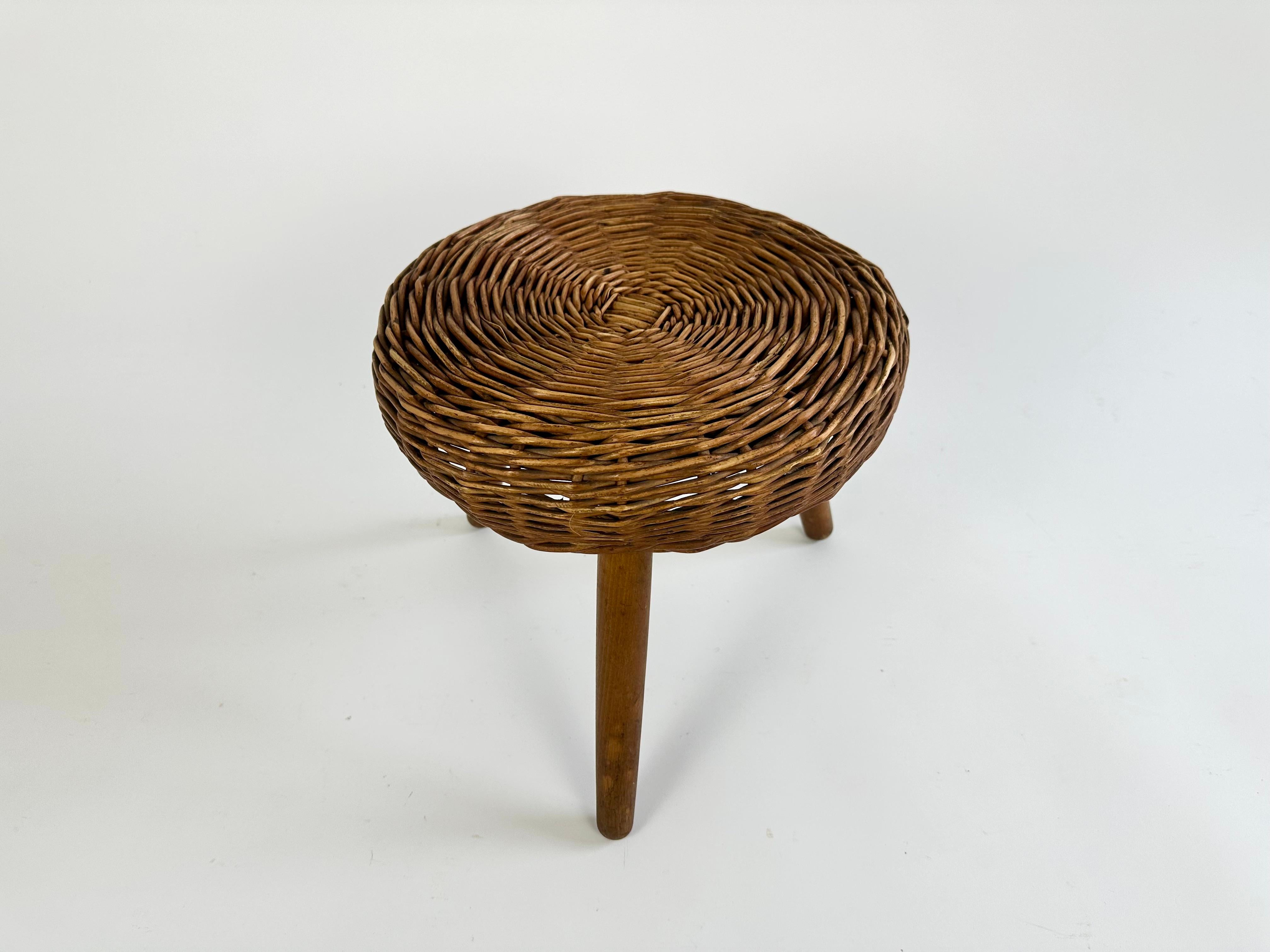 British Vintage wicker tripod stool in the manner of Tony Paul For Sale