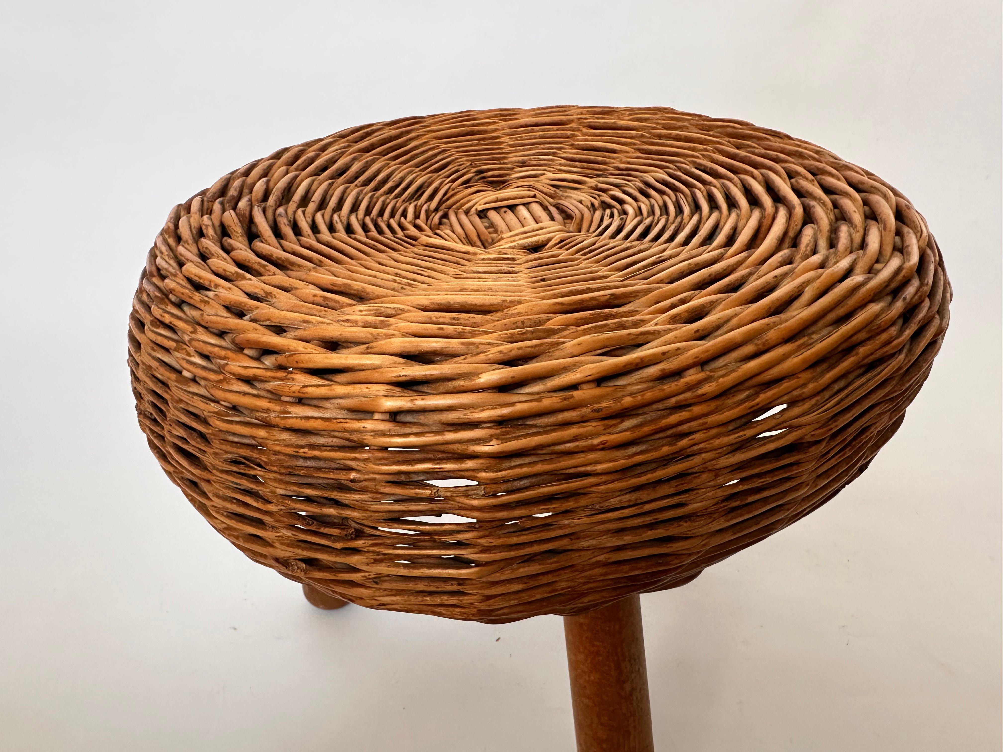 20th Century Vintage wicker tripod stool in the manner of Tony Paul
