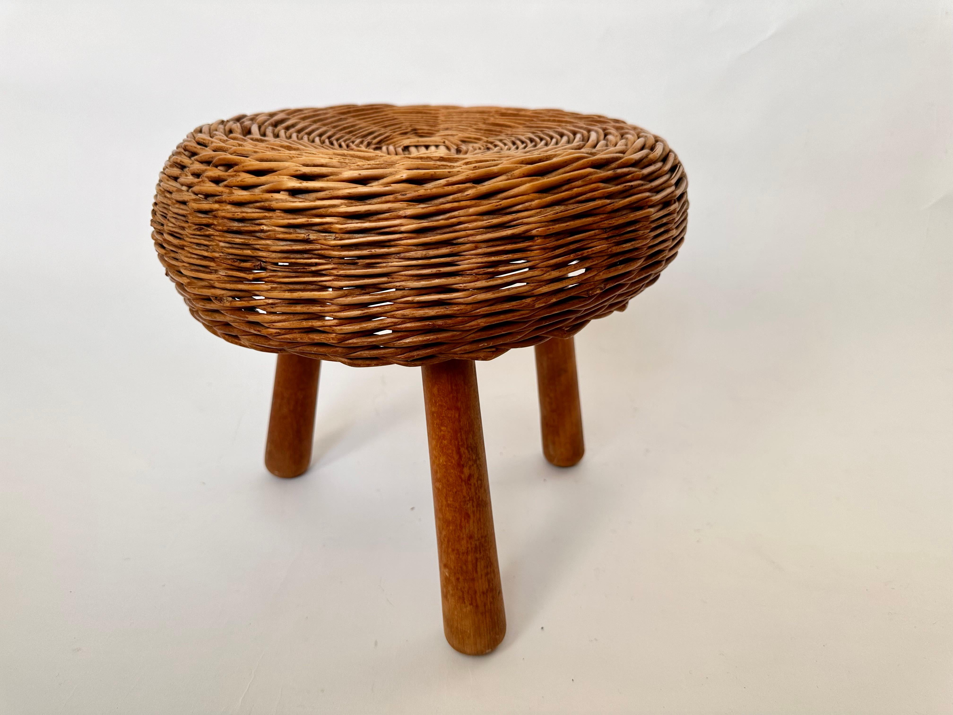 Wicker Vintage wicker tripod stool in the manner of Tony Paul