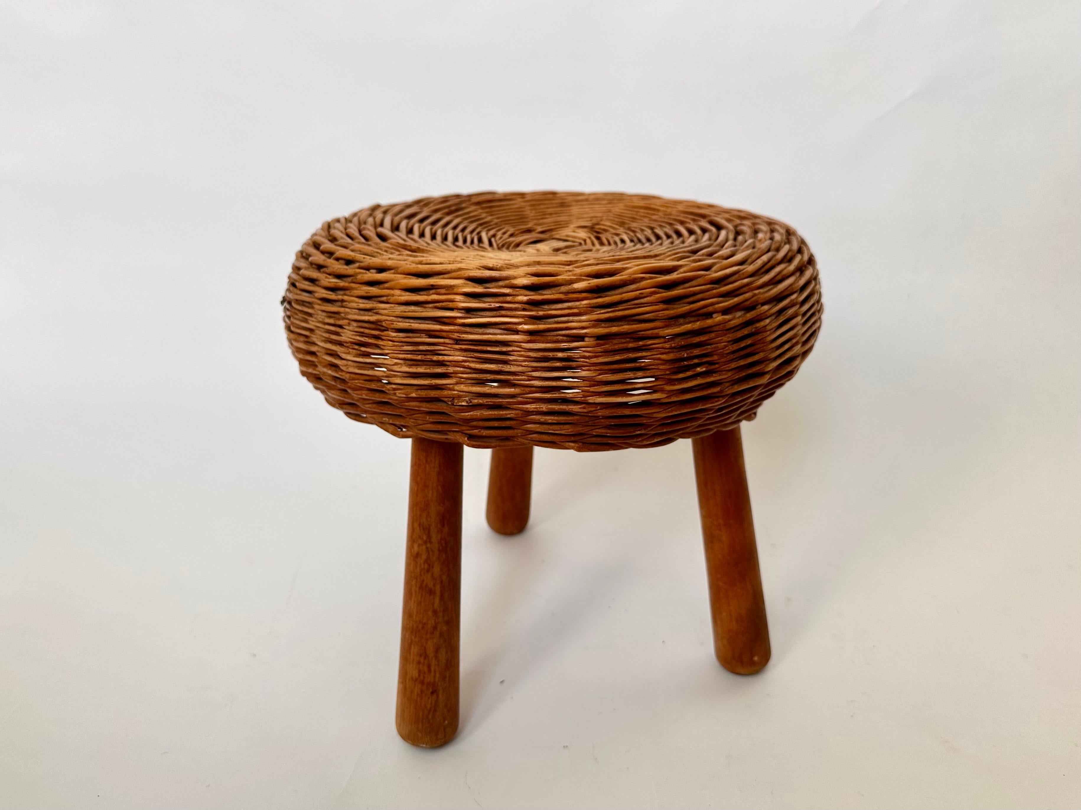Vintage wicker tripod stool in the manner of Tony Paul 1