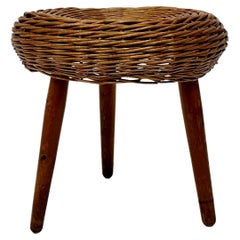 Vintage wicker tripod stool in the manner of Tony Paul