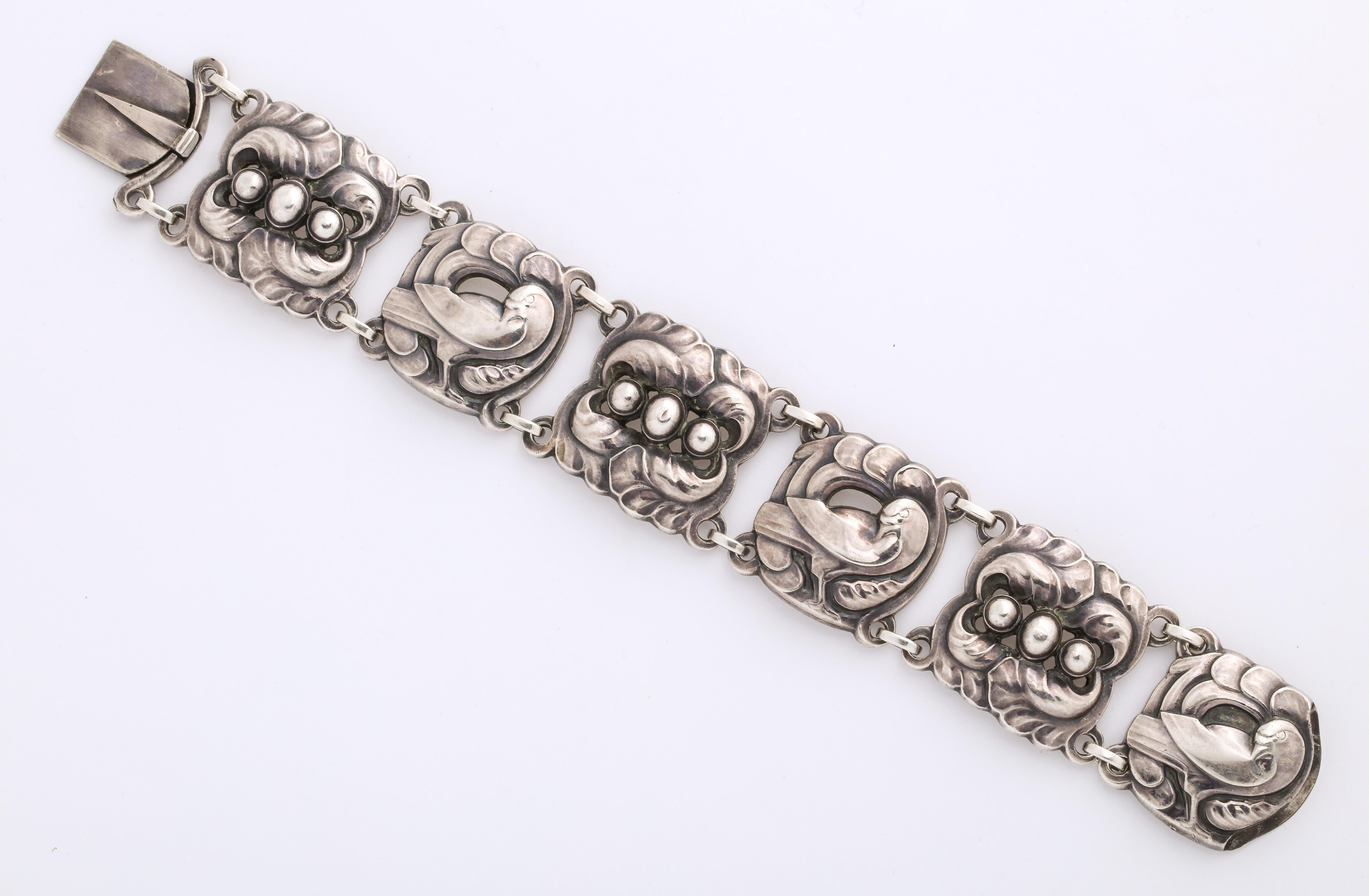 Isn't it lovely, a classic bracelet made by the internationally renowned Danish silversmith, Georg Jensen, c. 1933.. The bracelet, #32, can be seen in the Janet Drucker comprehensive reference book 