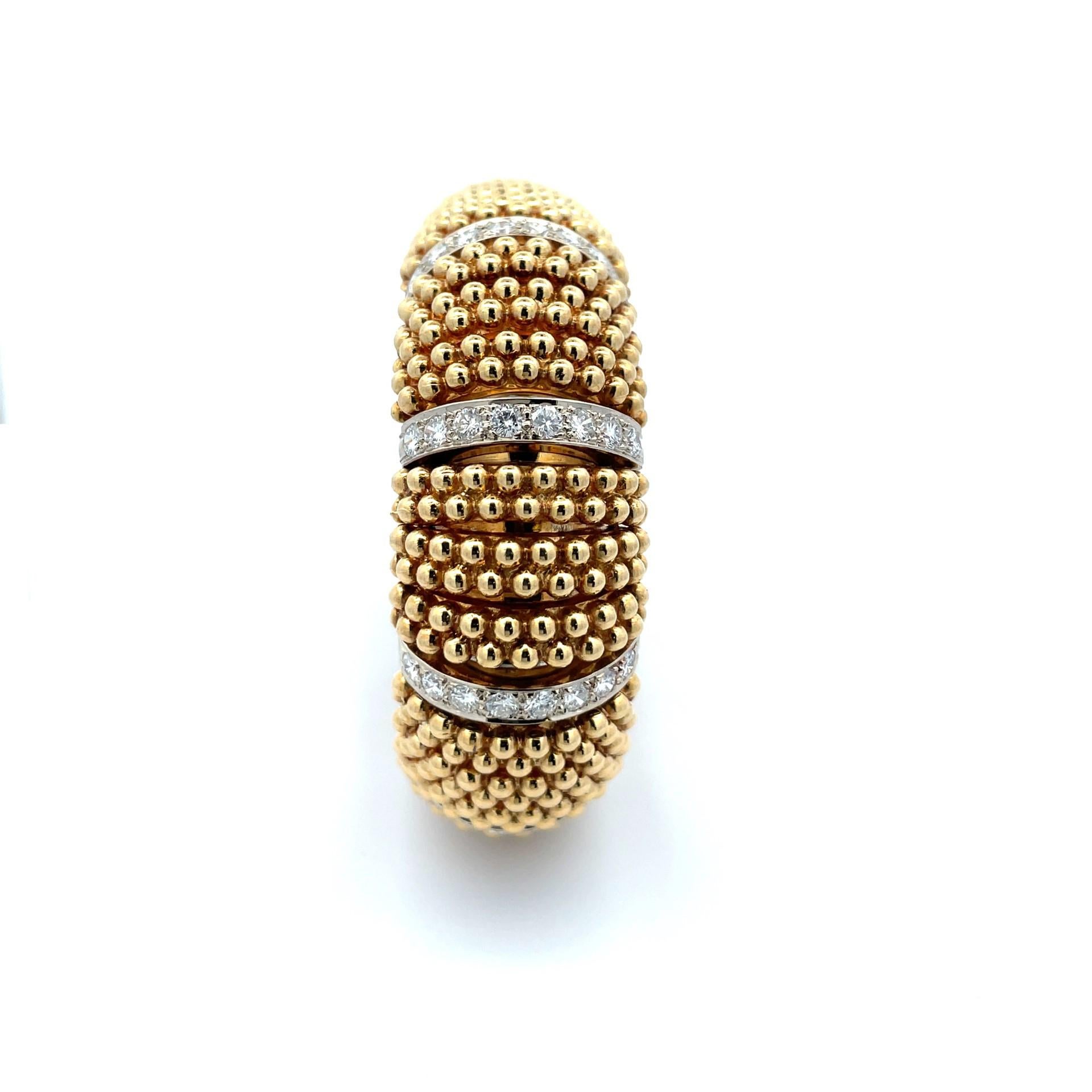Vintage wide multi rows gold beads and diamond bracelet with yellow gold stations in 18 karat and white gold diamond stations in 14 karat. 

80 brilliant cut diamonds weighing 5.20ct twt

 Gold weighing 91.60 grams

0.75