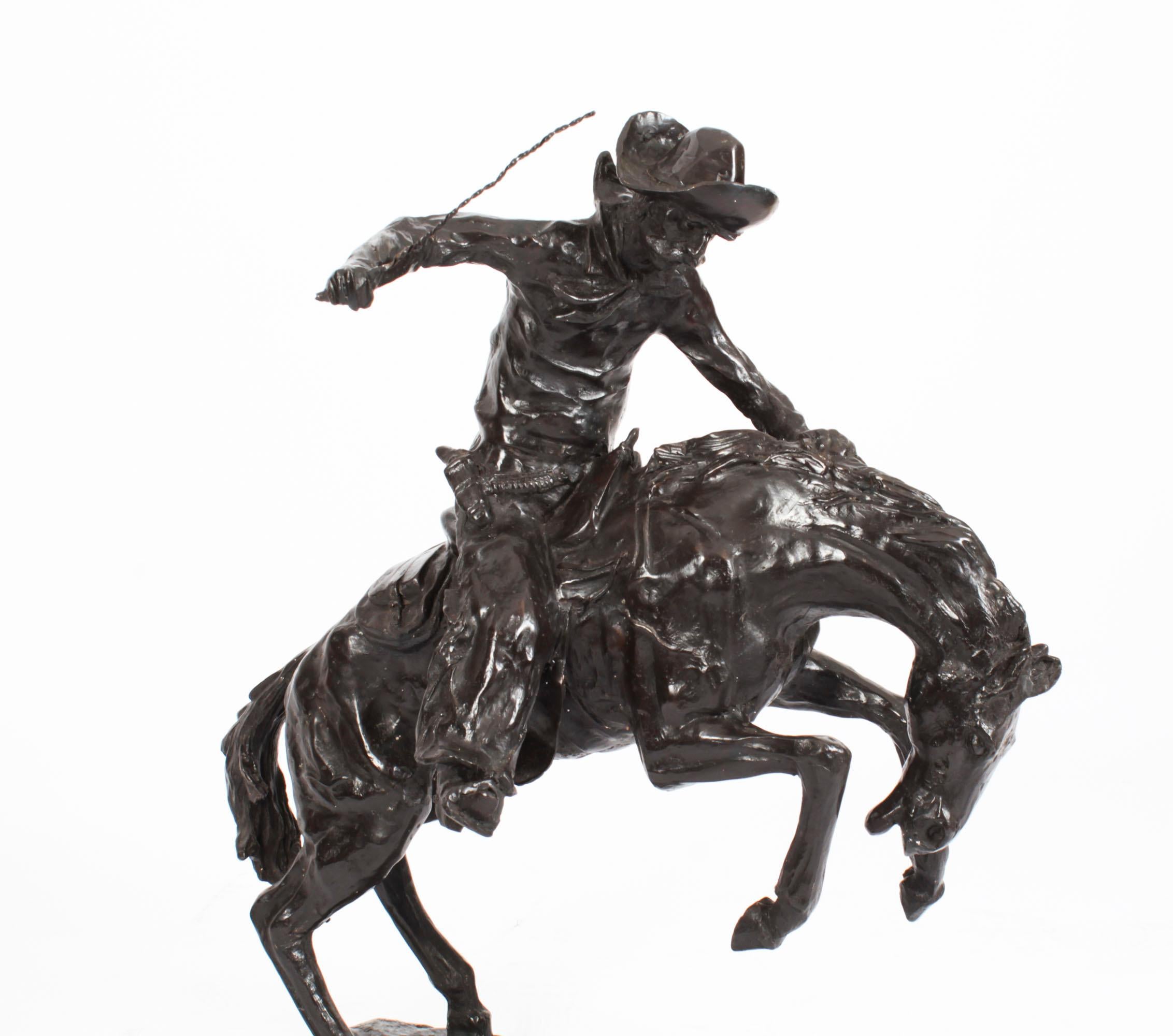 This is a very impressive bronze, after Remington, of a cowboy on horseback dating from the last quarter of the 20th century.

It was made using the 'lost wax' process, otherwise known as 'cire perdue', and is in the style of Frederic Remington's