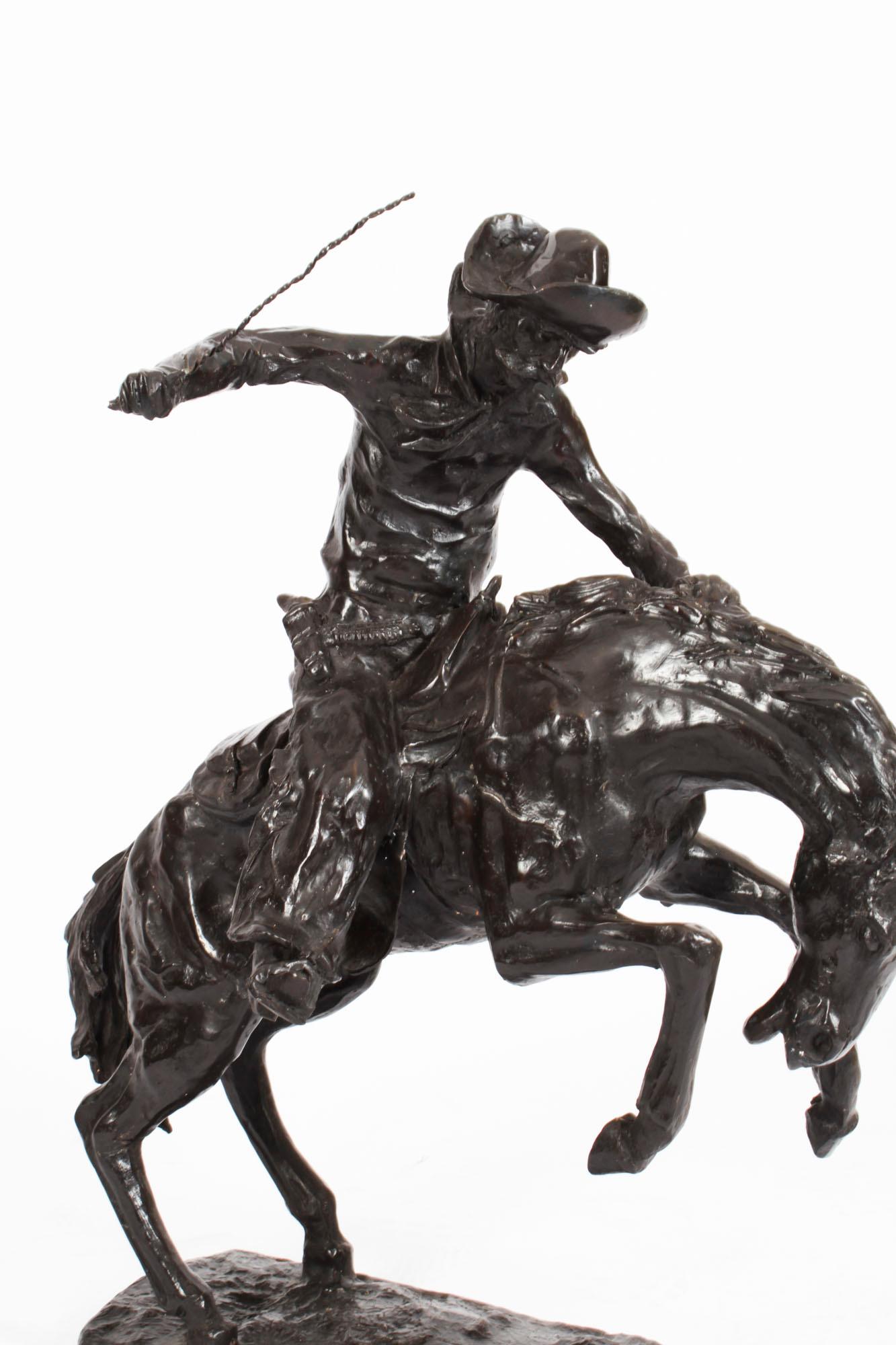 remington bronze cowboy on horse