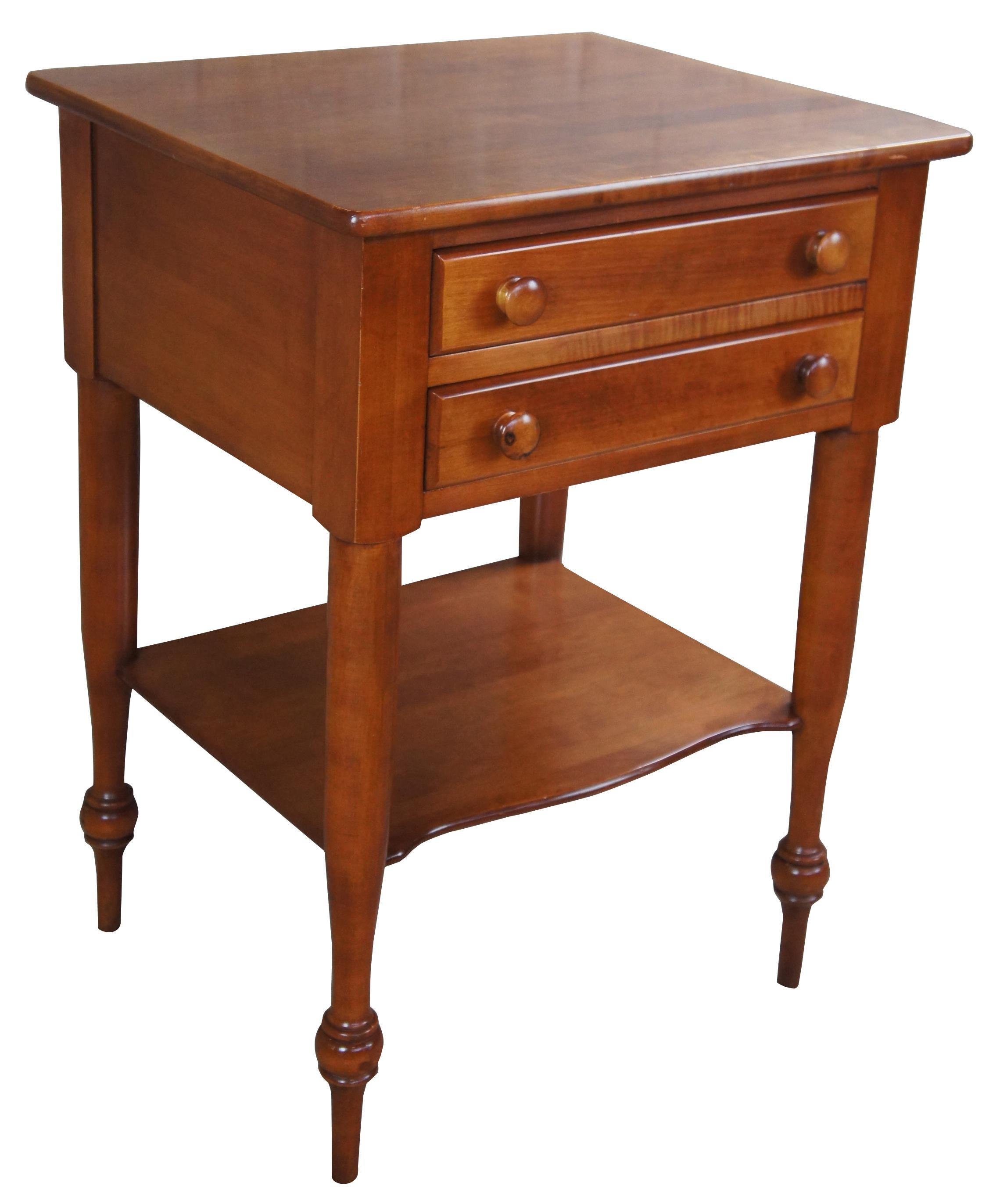 H. Willett maple nightstand or side table, circa 1960s. Features early American styling with wood knobs and turned legs. Measure: 28