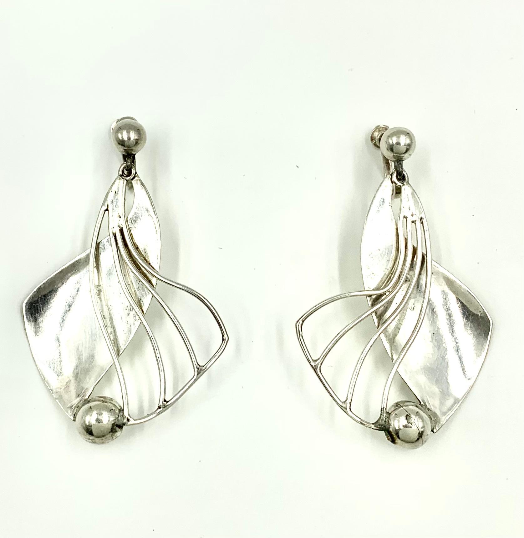 These beautiful, large William Spratling earrings have the ephemeral feel of butterfly wings.
William Spratling, Architecture professor and lecturer, has been called the Father of Mexican Modernist Silver Design. He earned a degree in architecture