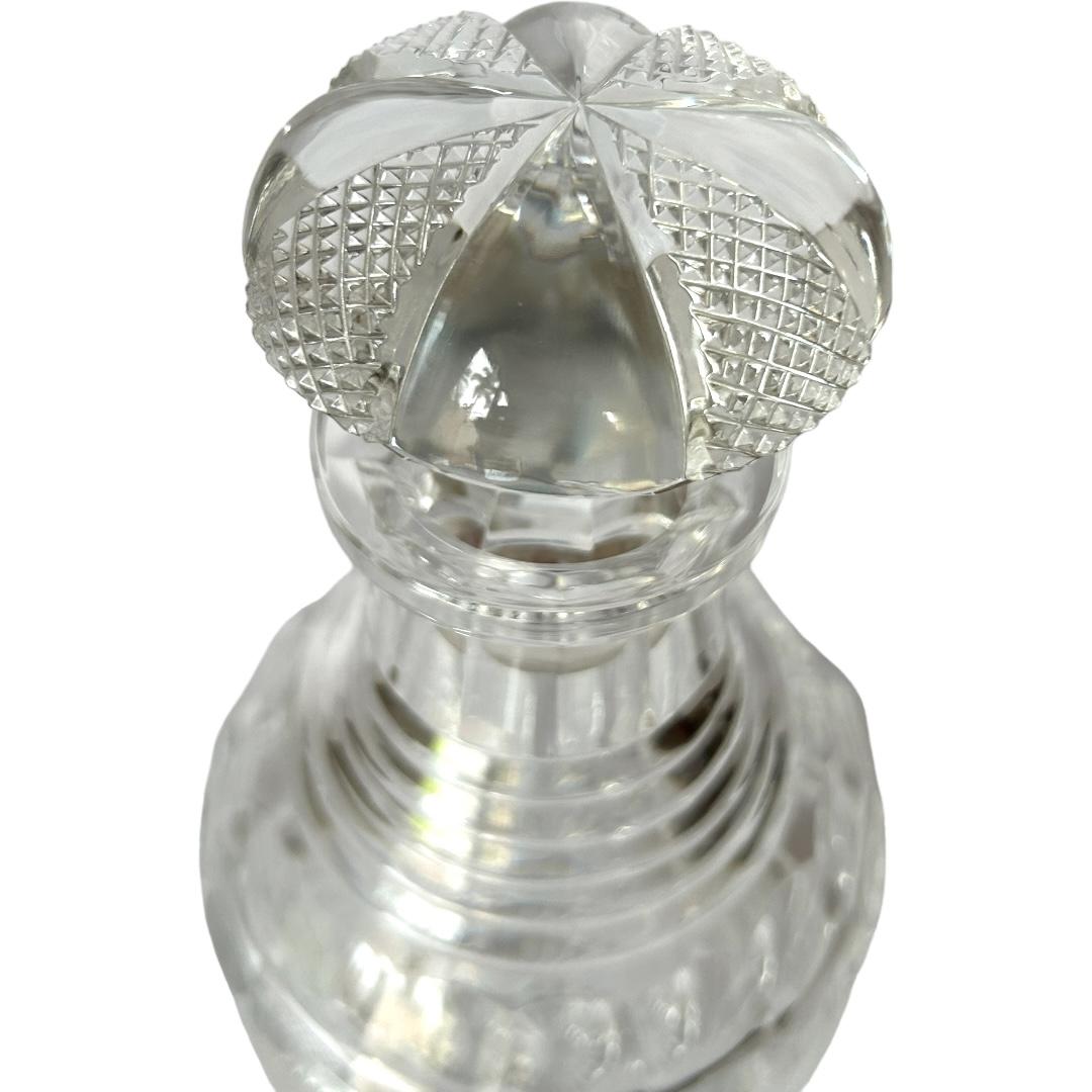 This vintage William Yeoward magnum “Carla” cut crystal decanter is a stunning addition to any bar ware collection.  The decanter, made in England, features a beautiful clear color, hobnail cut cross hatch panels and is perfect for all occasions. 