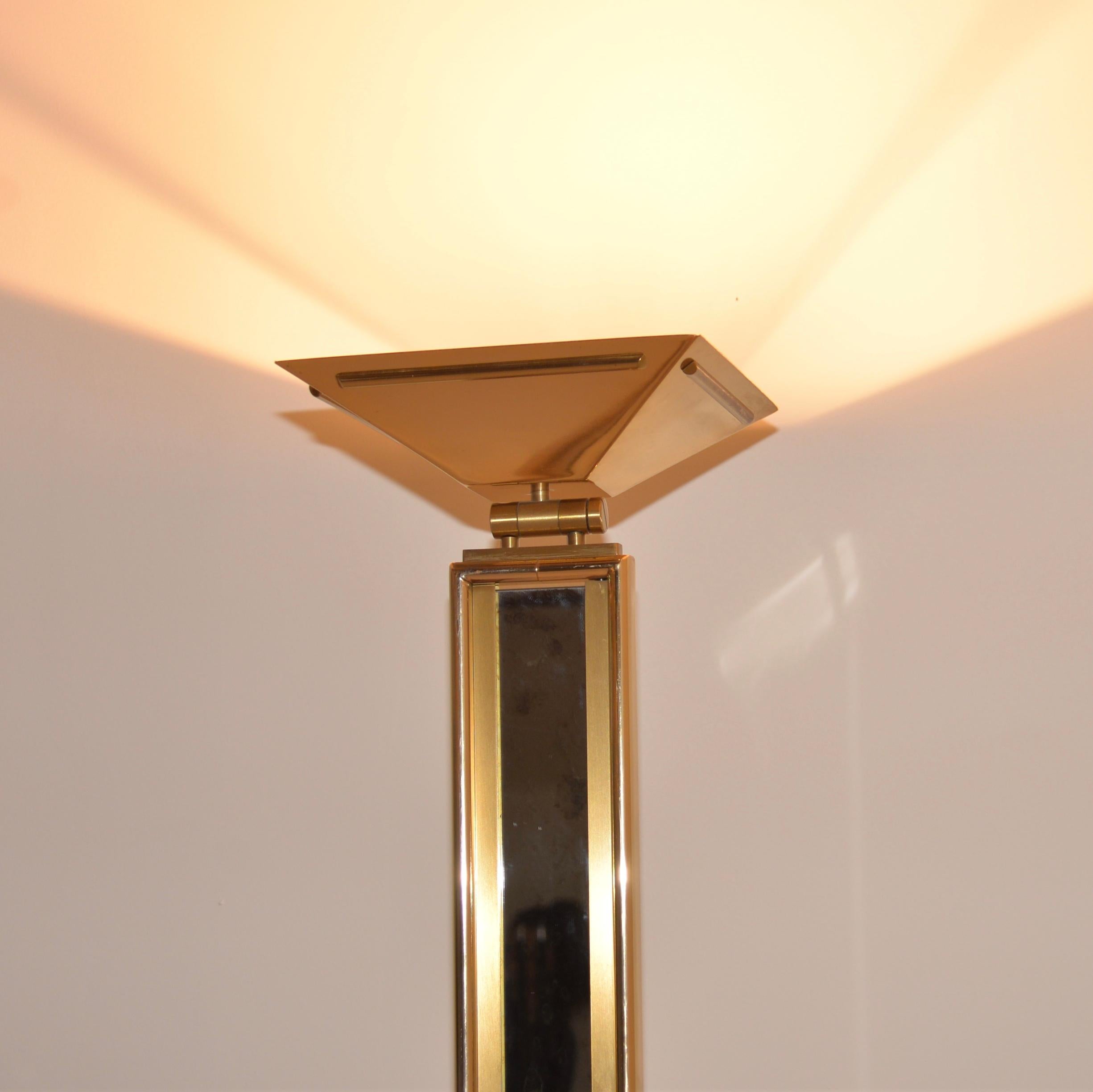 A vintage 1970s Willy Rizzo style uplighter lamp. This retro French lamp is very stylish and has brass water effect mirrored glass within a polished frame topped with a conical uplighter shade. This item also has a dimmer switch.