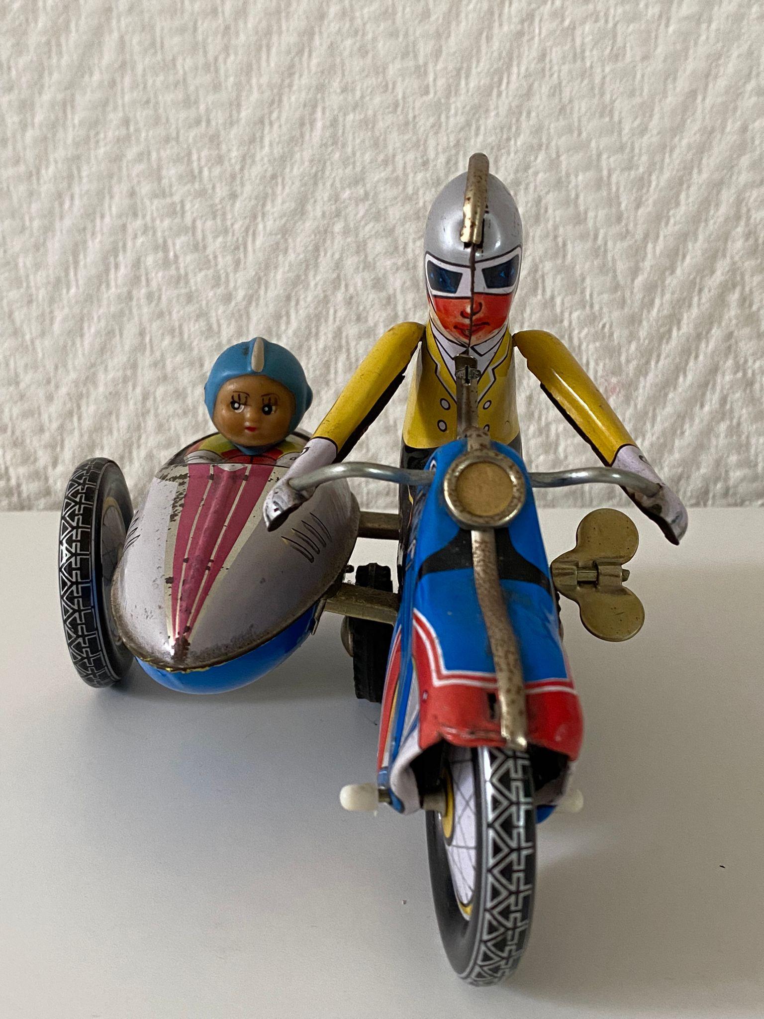 Industrial Vintage Wind-Up Tin Toy Motorcycle with Co-Driver and Key For Sale