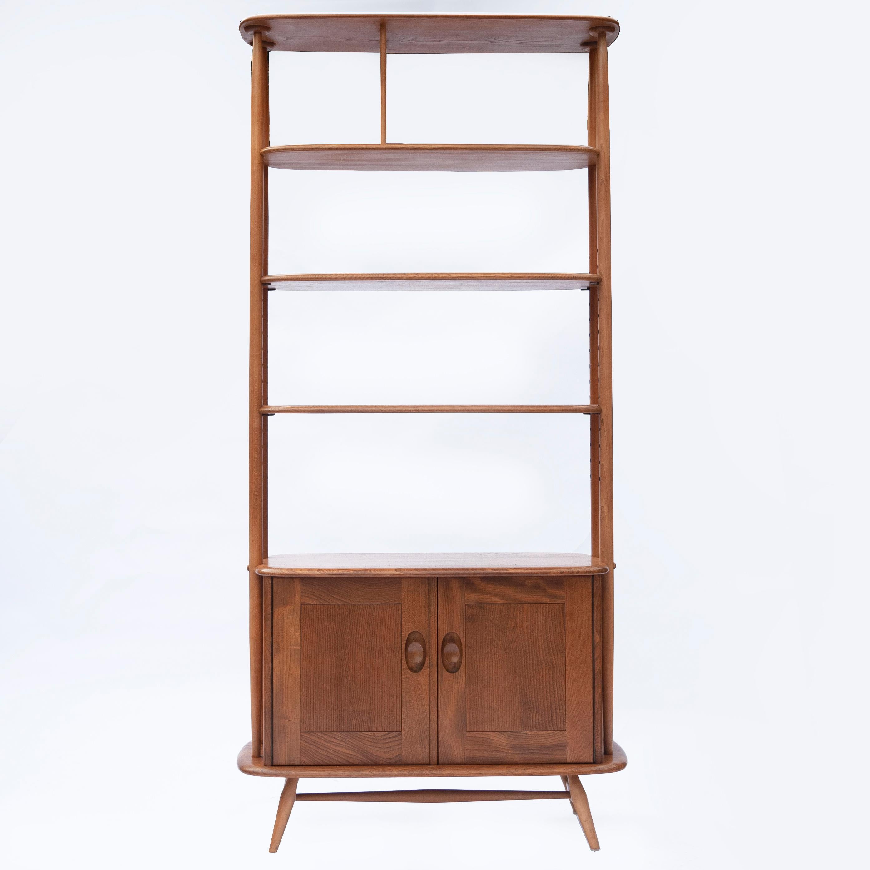 A floor elm wall unit by Ercol. It features a base with two doors with inner shelf.

Manufacturer - Ercol

Design Period - 1960 to 1969

Country of Manufacture - U.K

Style - Mid-CenturyDetailed Condition - Good with minimal