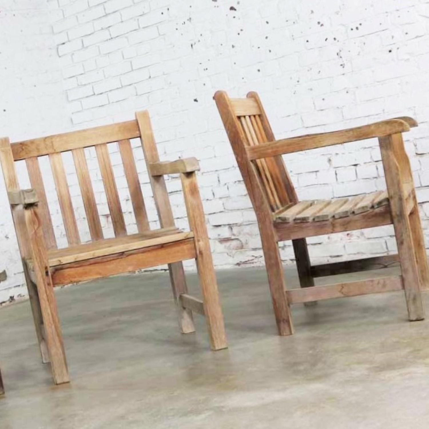 Handsome natural teak vintage Windsor outdoor patio or deck armchair. We have a total of 4 and are pricing them per chair. These chairs are in wonderful sturdy condition with the natural age patina of teak that has spent some time outside but cared