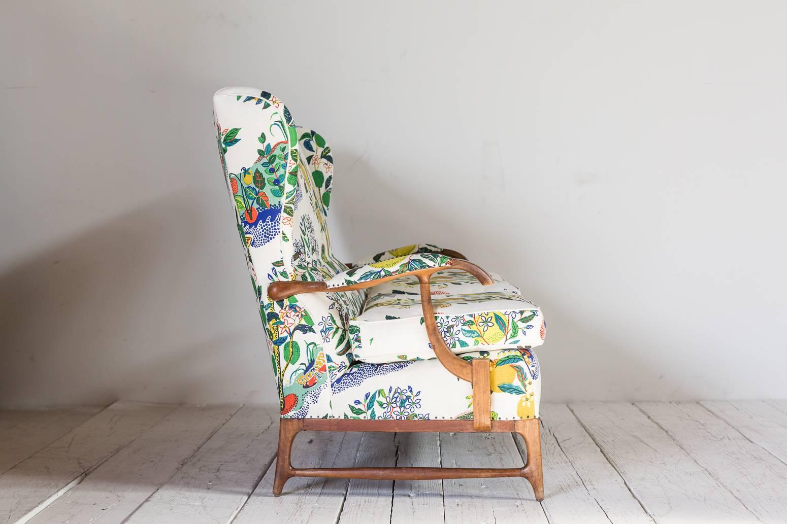 Vintage Wingback Settee Newly Upholstered in Colorful Josef Frank Fabric In Excellent Condition In Los Angeles, CA