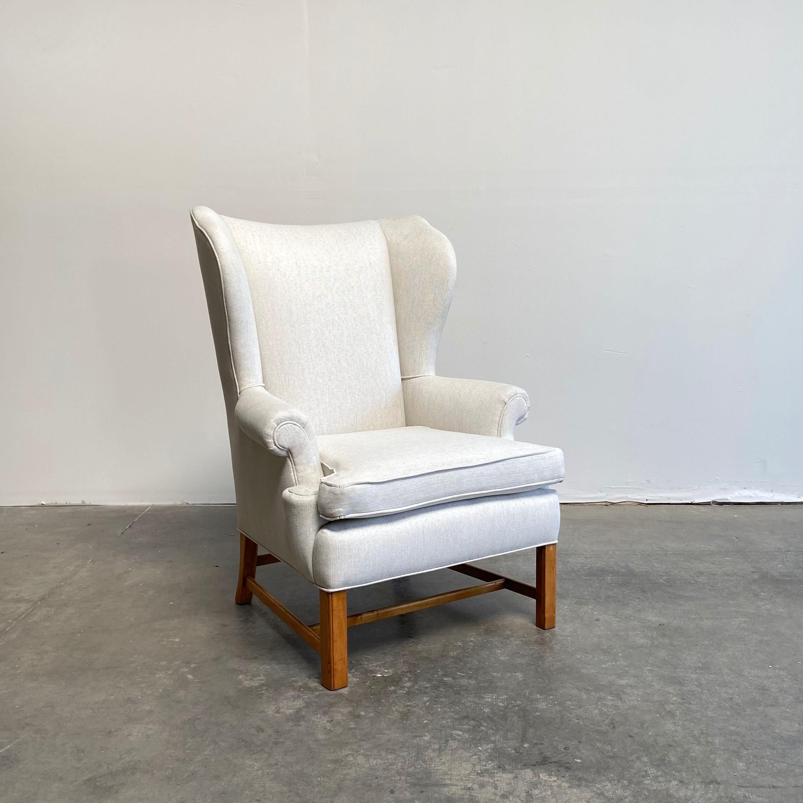 Vintage wing chair with new upholstery.
Size: 30” W x 31” D x 42” H
Seat height 19”
Seat depth 19”
Arm height 24”
Upholstery is in a linen blend, light natural color. Seat is a foam in medium density.