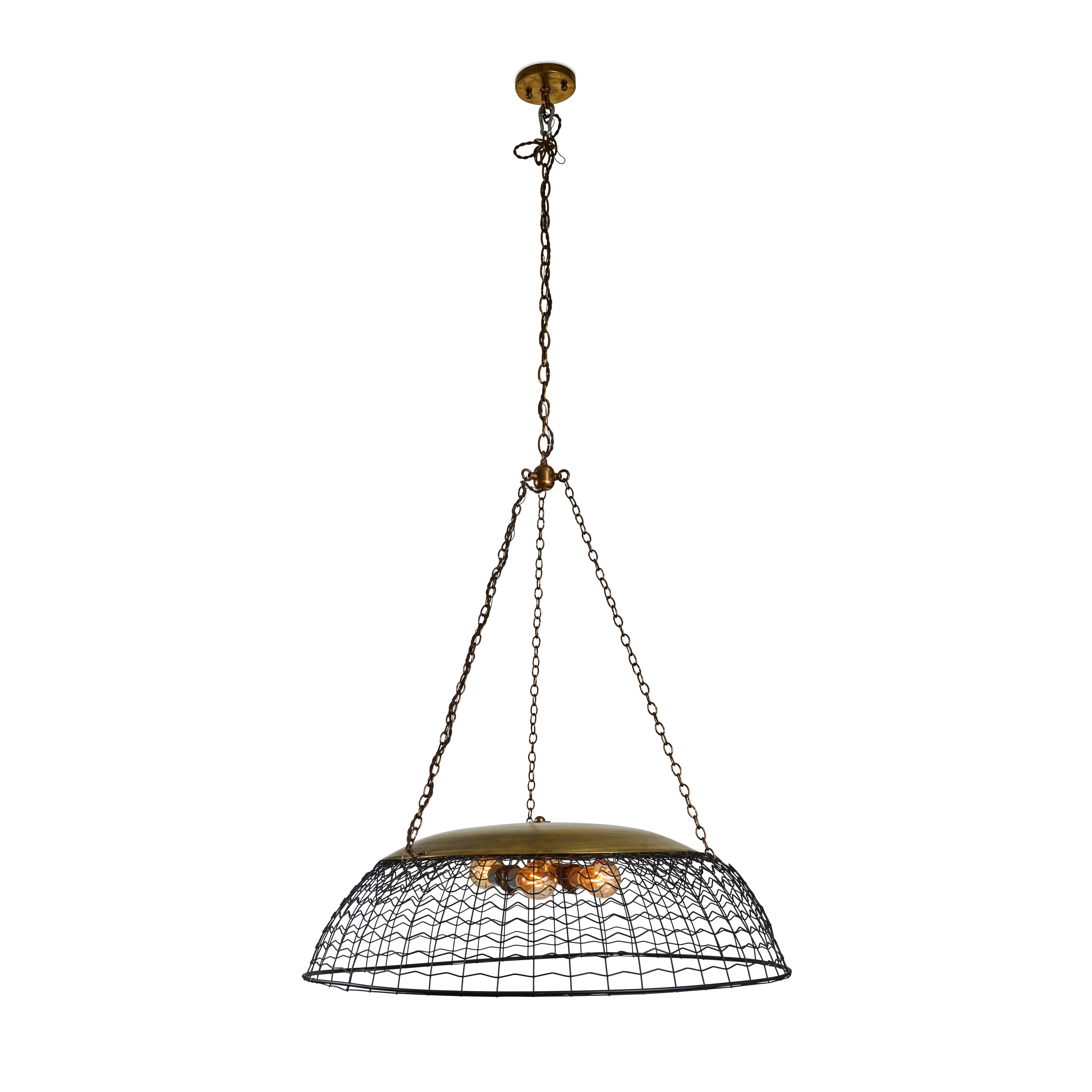 Light up the room with this fantastic vintage wire basket fixture.  It has a rich black finish and was made into a hanging piece with an antique brass cap and 3 chains held by a toggle connector. It has been newly wired and holds 4 bulbs.

It