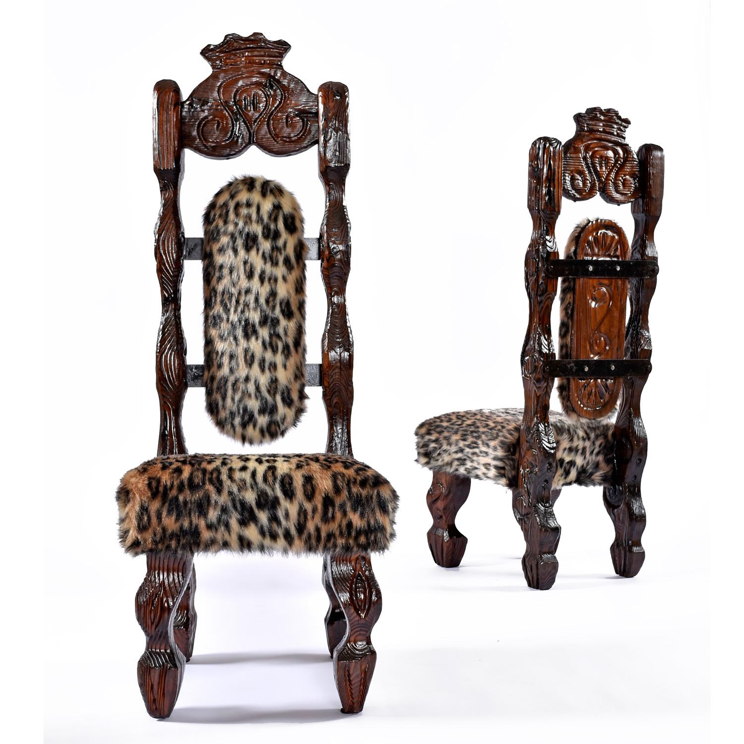 Take a walk on the wild side, or maybe just have a seat there with scepter in hand. Each chair has been recovered in high-quality, cruelty free, faux-fur that very much resembles the look and feel of leopard fur. Adorned top to bottom with