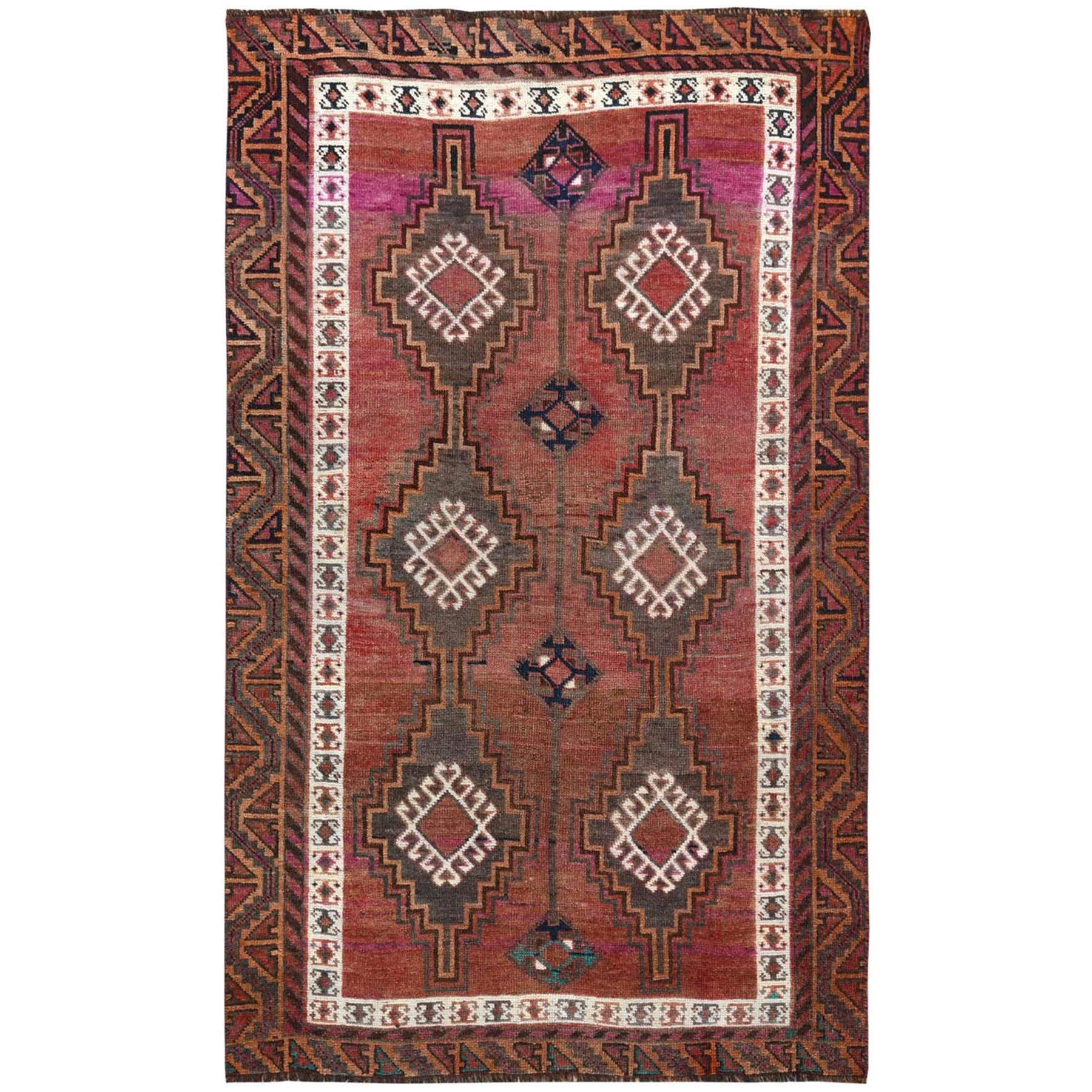 Vintage with Even Wear Persian Shiraz Abrash Worn Down Hand Knotted Rug For Sale