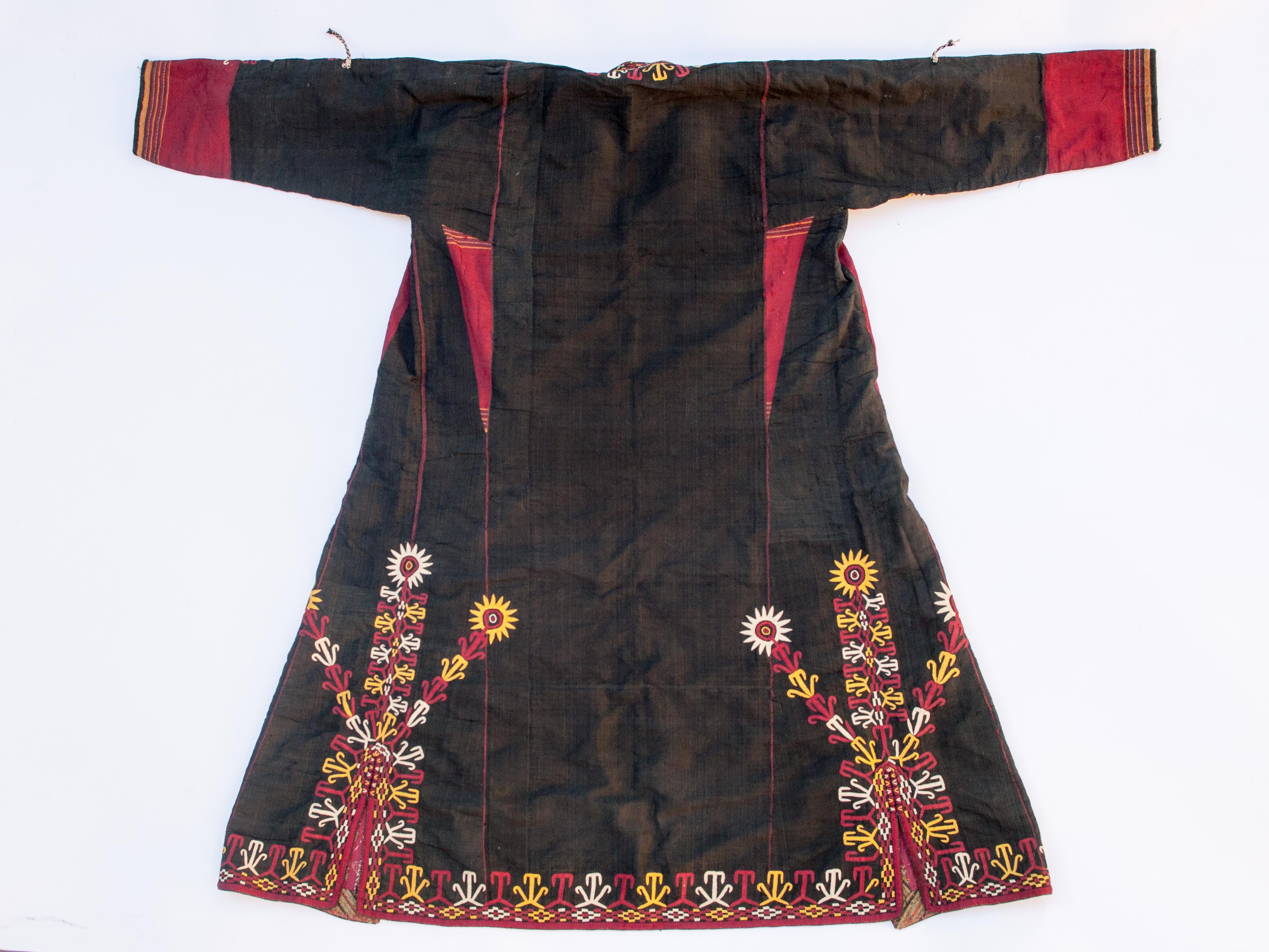 Vintage Women's Cloak or Jacket, called a Chyrpy, From the Tekke Turkman group of southern Turkestan, Mid- to Late 20th Century
This finely embroidered garment would have been worn on special ceremonial occasions as a kind of cloak rather than as a