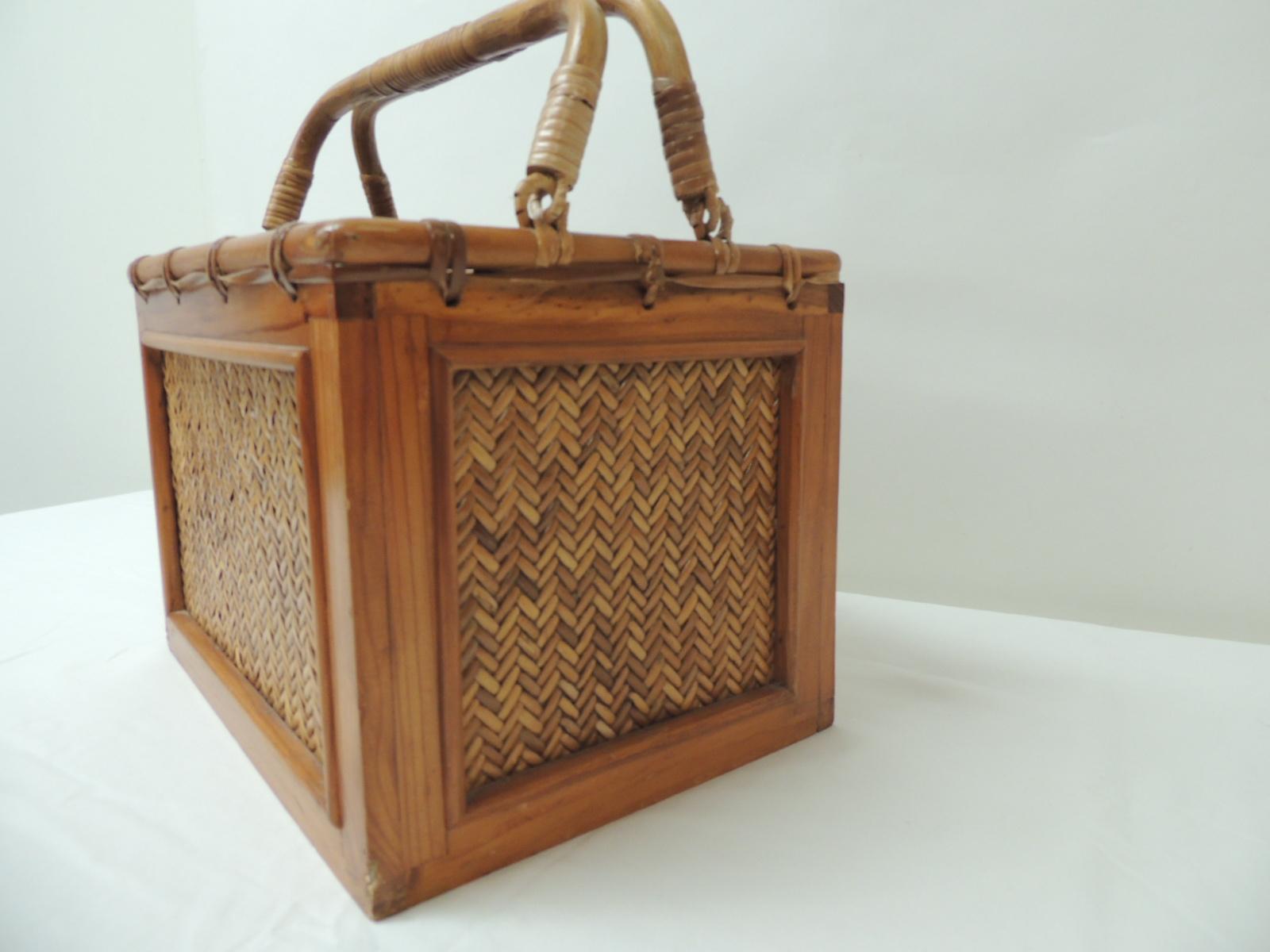 Wooden bamboo handle and wicker panels magazine rack/holder or basket.
Size: 13 W x 10 D x 13.5 H.