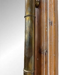 Miroir vintage en bois et laiton