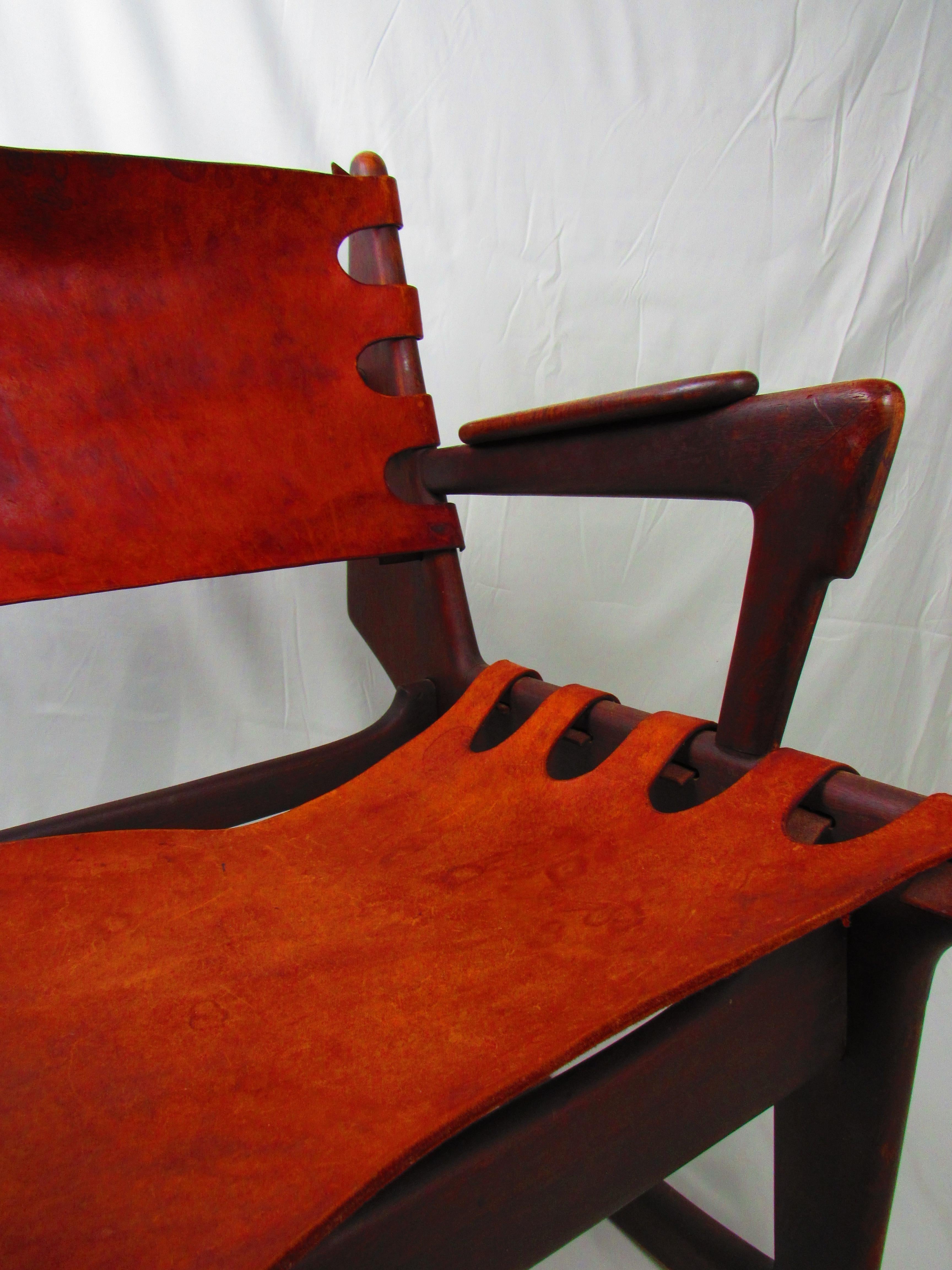 European Angel Pazmino rocking chair, vintage wood and leather For Sale